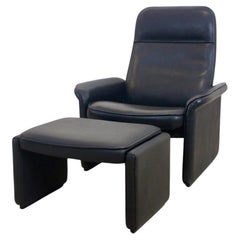 Ensemble chaise longue et pouf réglable en cuir noir épais et souple De Sede DS-50
