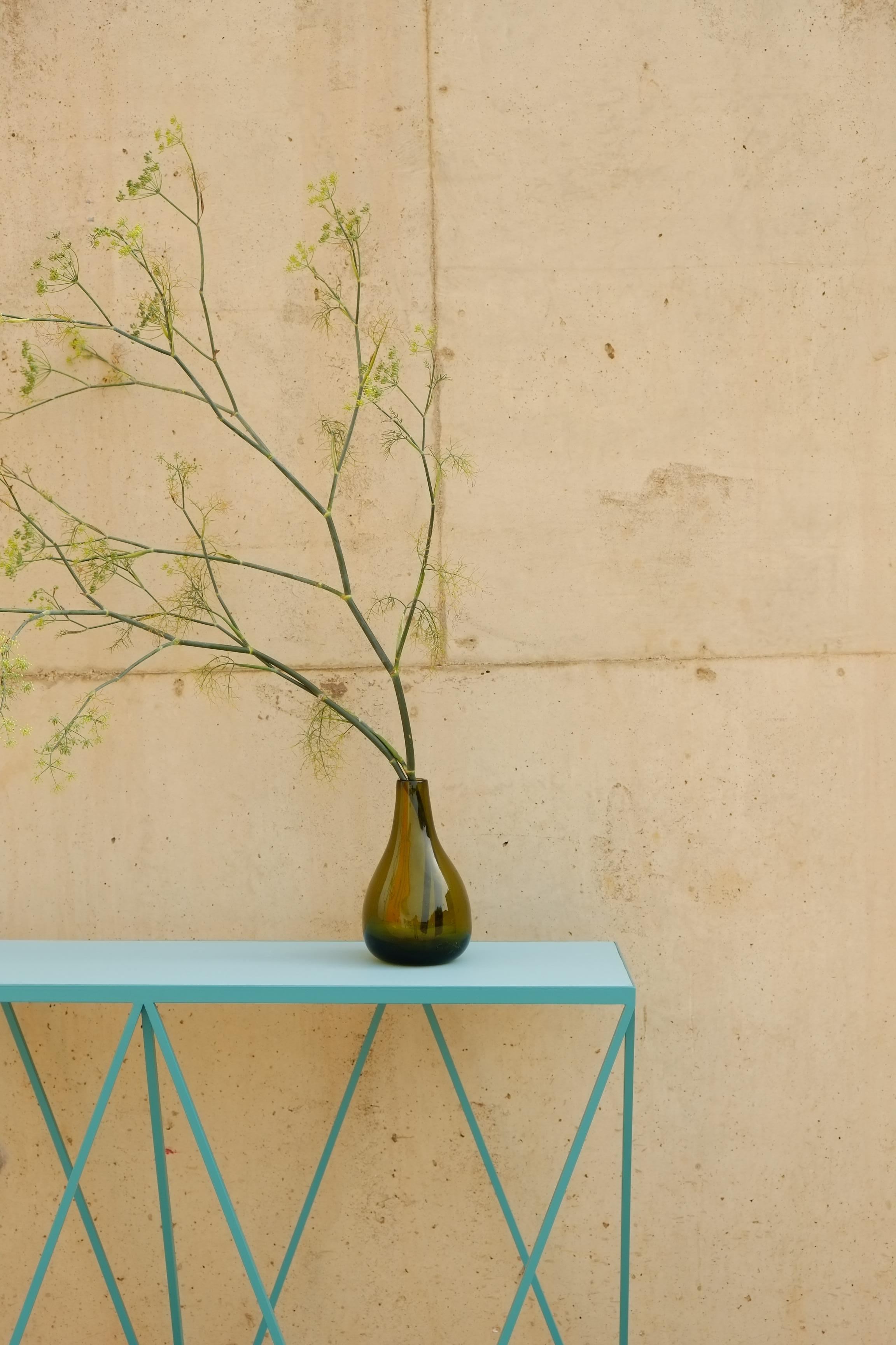 Welded Soft Turquoise Giraffe Console Table with Linseed Linoleum Table Top For Sale