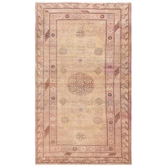 Soft Yellow and Mauve Antique Khotan East Turkestan Rug. Size: 5
 7" x 9
 4"