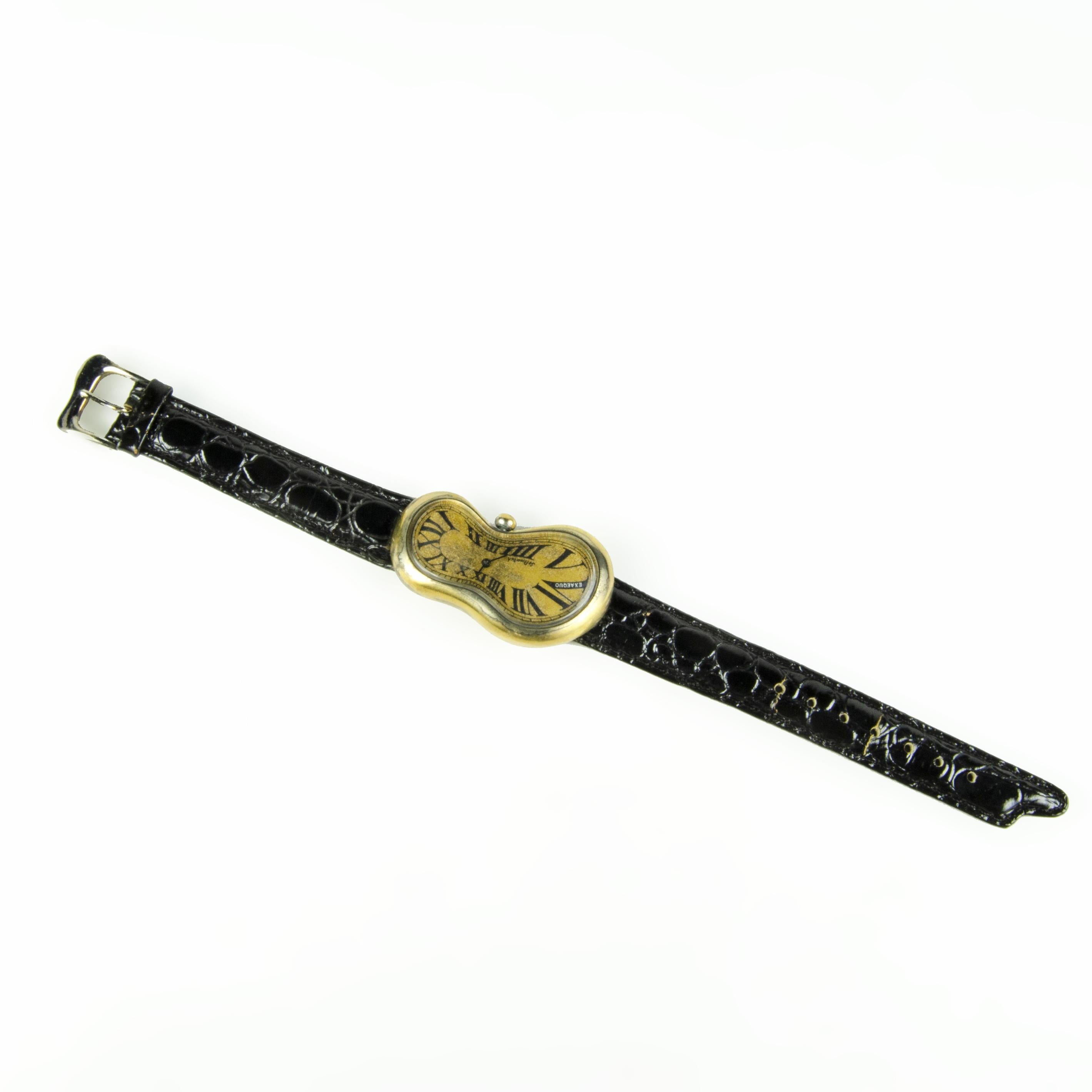 Softwatch: 1990s leather and gilt melting metal quartz wristwatch by Exaequo, Hong Kong, based on “The Persistence of Memory” by Salvador Dalí

By: Exaequo, Salvador Dalí (in the style of)
Material: metal, quartz, leather, glass, crystal,