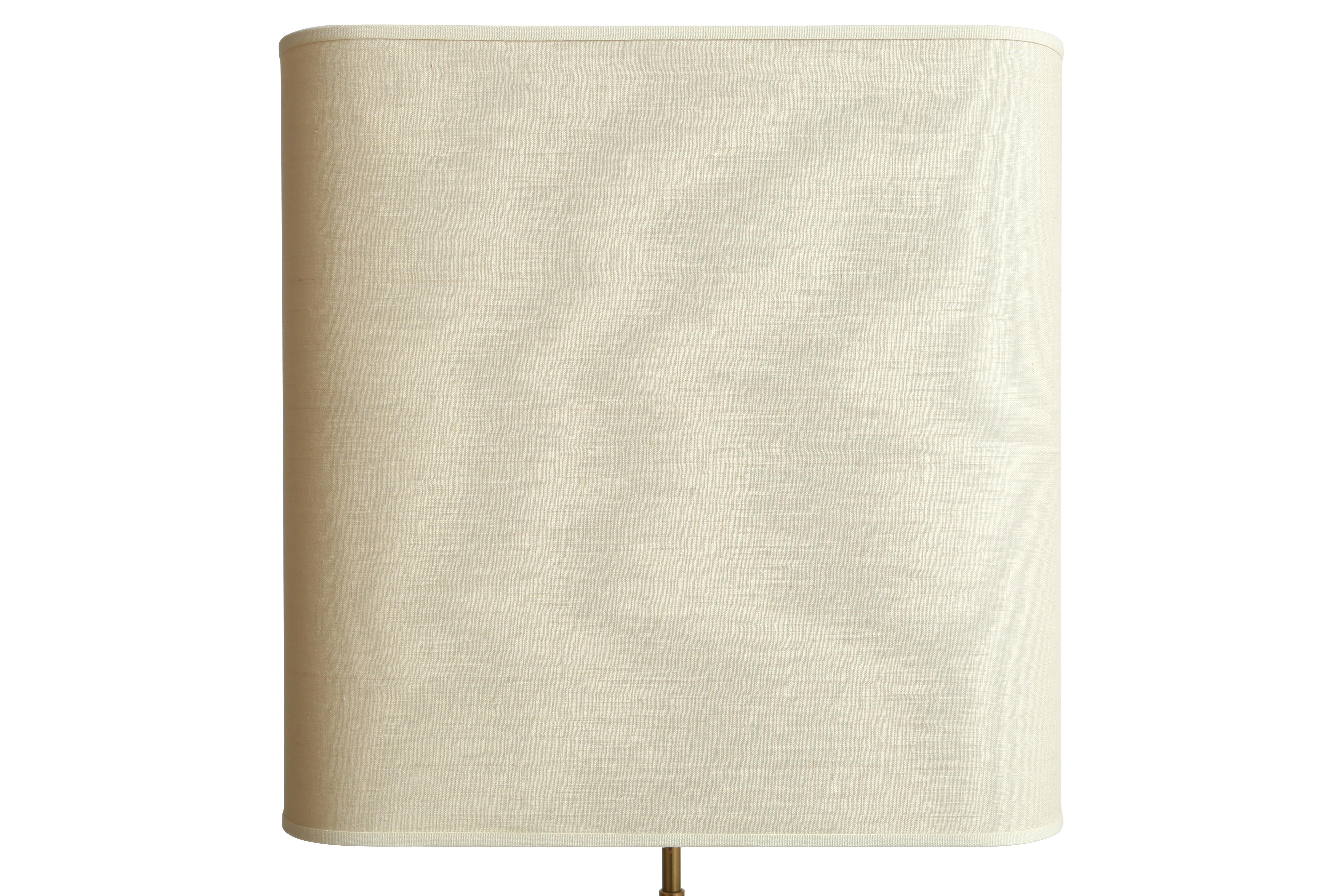 Sogno table lamp with brass base and white fabric lampshade.
Dimensions:
6.5 