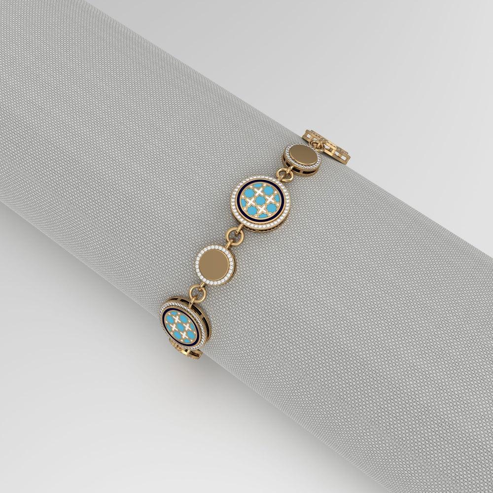 Omira Bracelet Medium, from our award winning Miraas collection, meticulously crafted in 18kt gold, with finely assorted diamonds, and set with eight point star Morroccan Zilij pattern in specially formulated Prussian Blue, Sky Blue and Ivory White