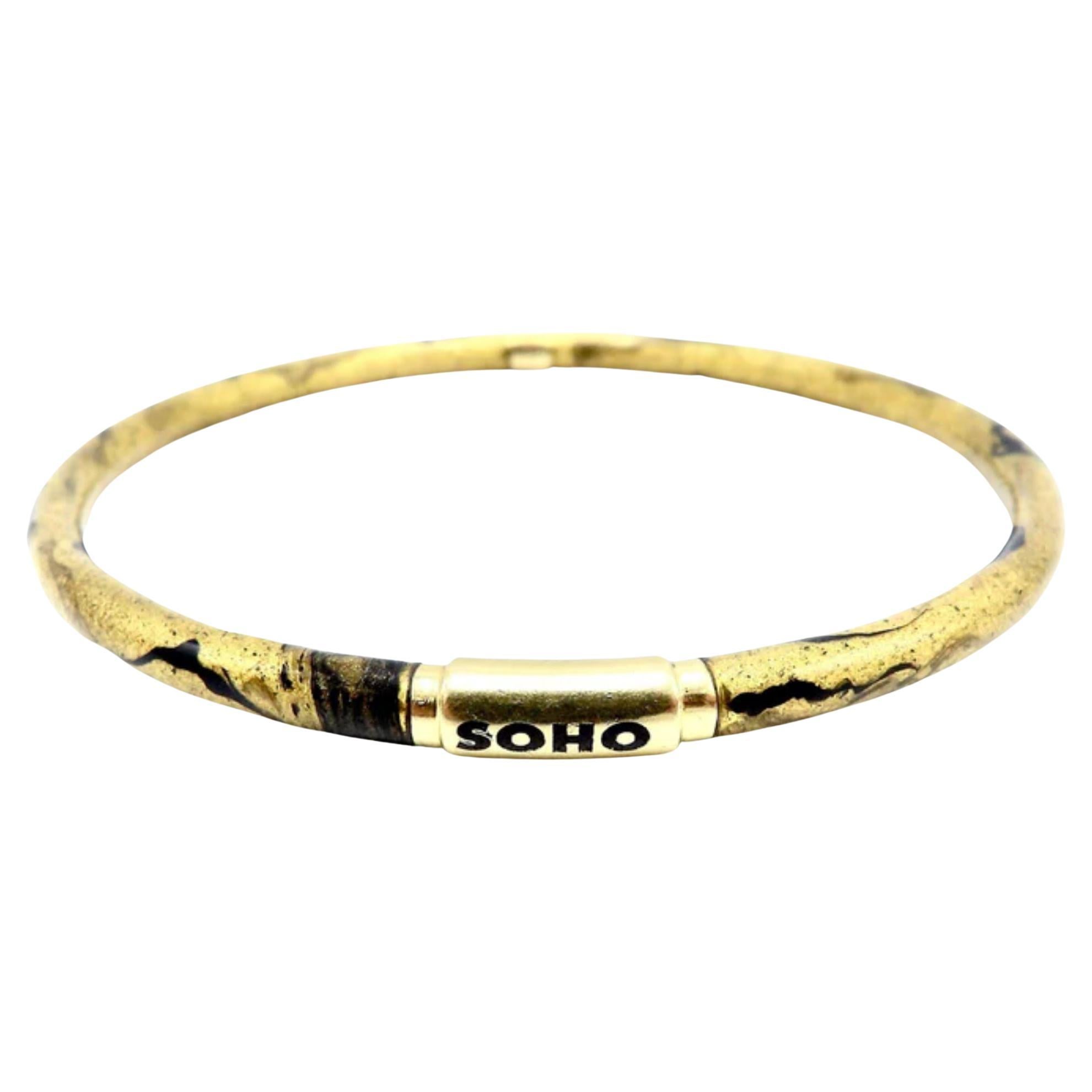Soho 18K Gold Enamel Golden Calligraphic Stripe Bangle Bracelet, circa 2010 For Sale
