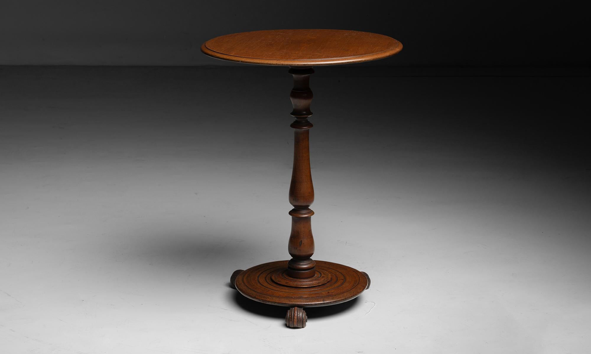 Soho Bazaar Wine Table

England circa 1840

Elegant side table in mahogany. Turned and carved details. Stamped underneath.

20.75”dia x 27”h