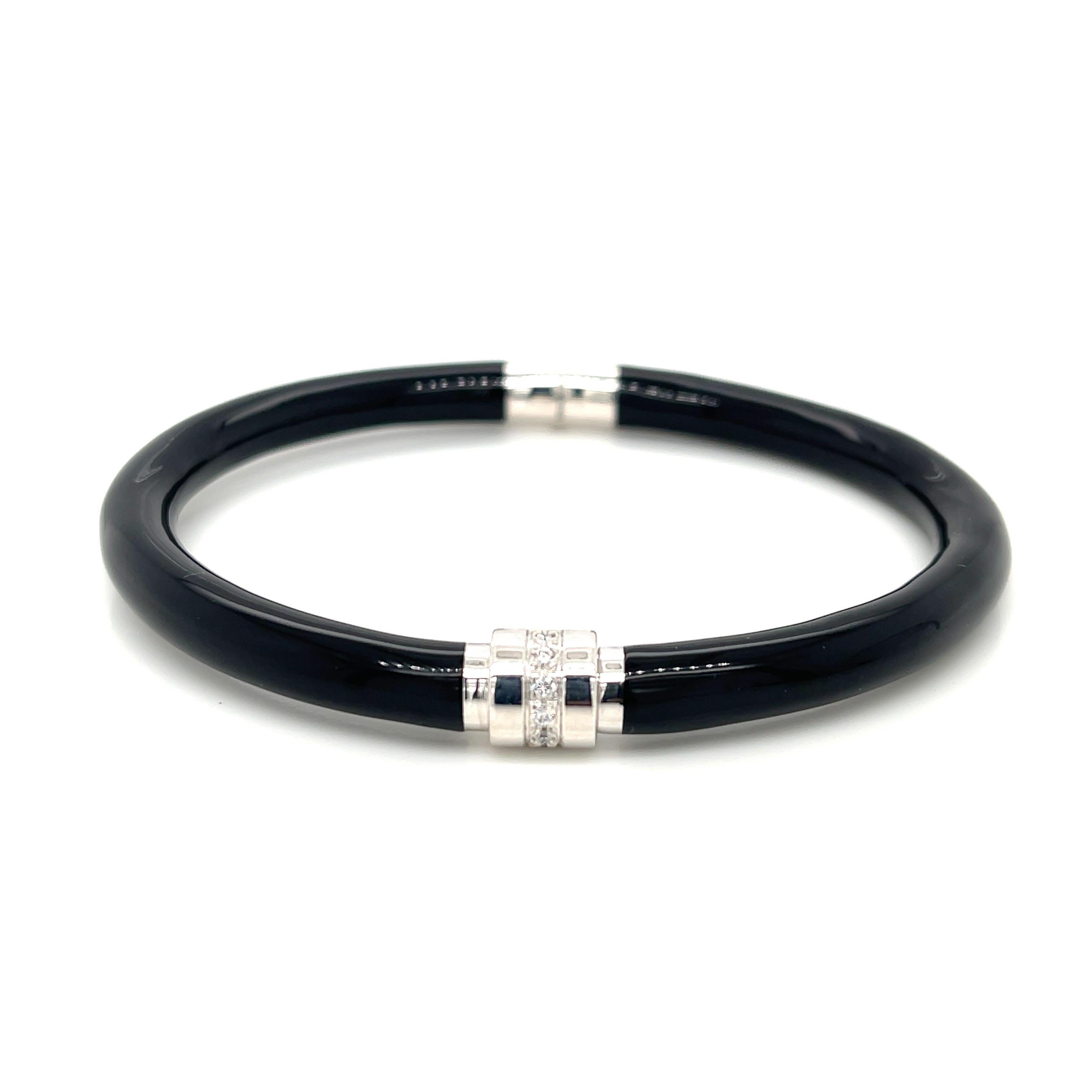 SOHO black enamel, sterling silver, and diamond (.08ctw) hinged bangle. Handcrafted in Italy. Inner circumference is 6.5 inches. 