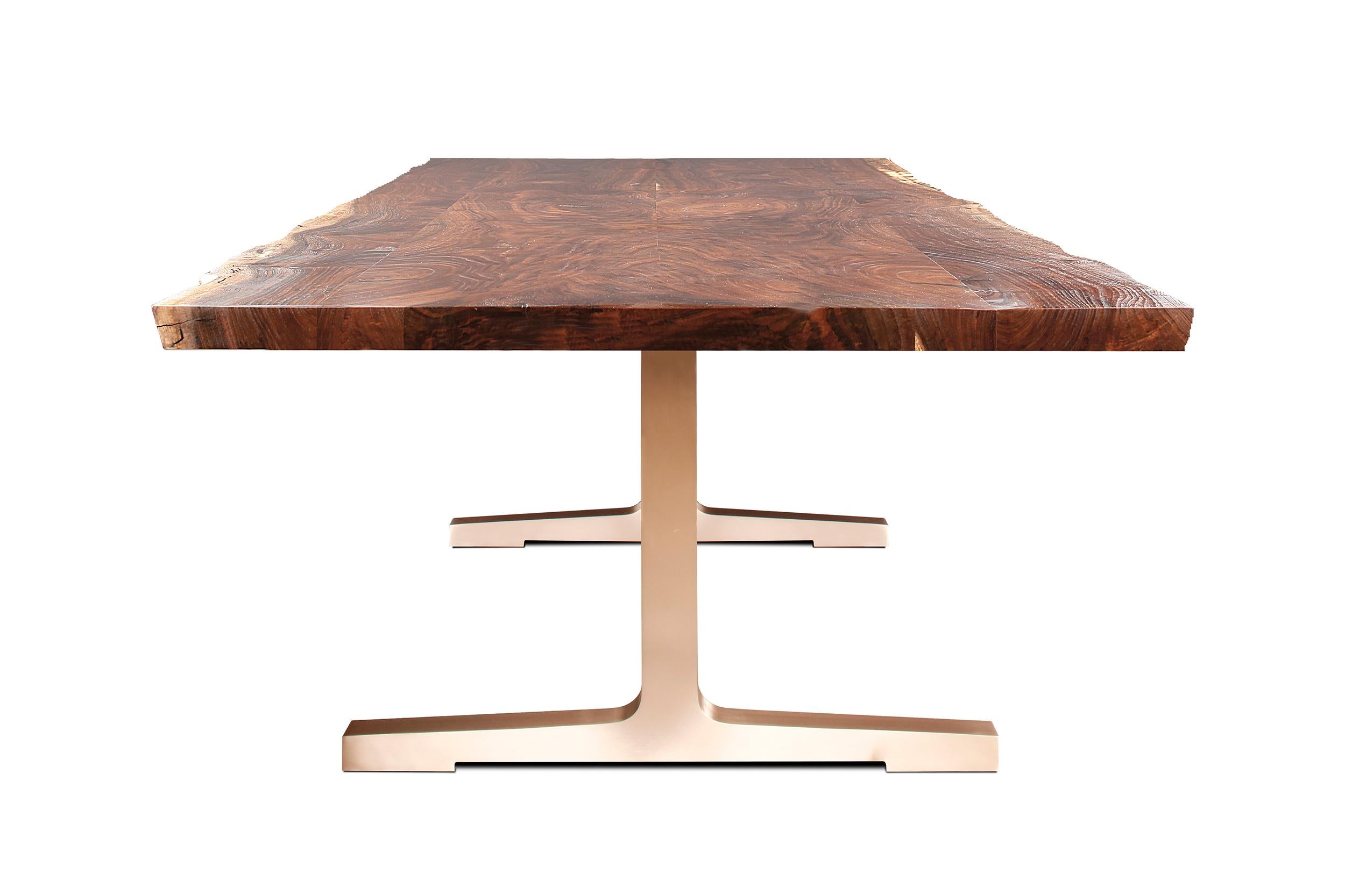 Unmistaken in it’s harmonious and carefully contoured profile, the SOHO table adds another level of elegance and sophistication to your dining room.

The art of fabricating bronze is only mastered by a few, and we have perfected this craft with over