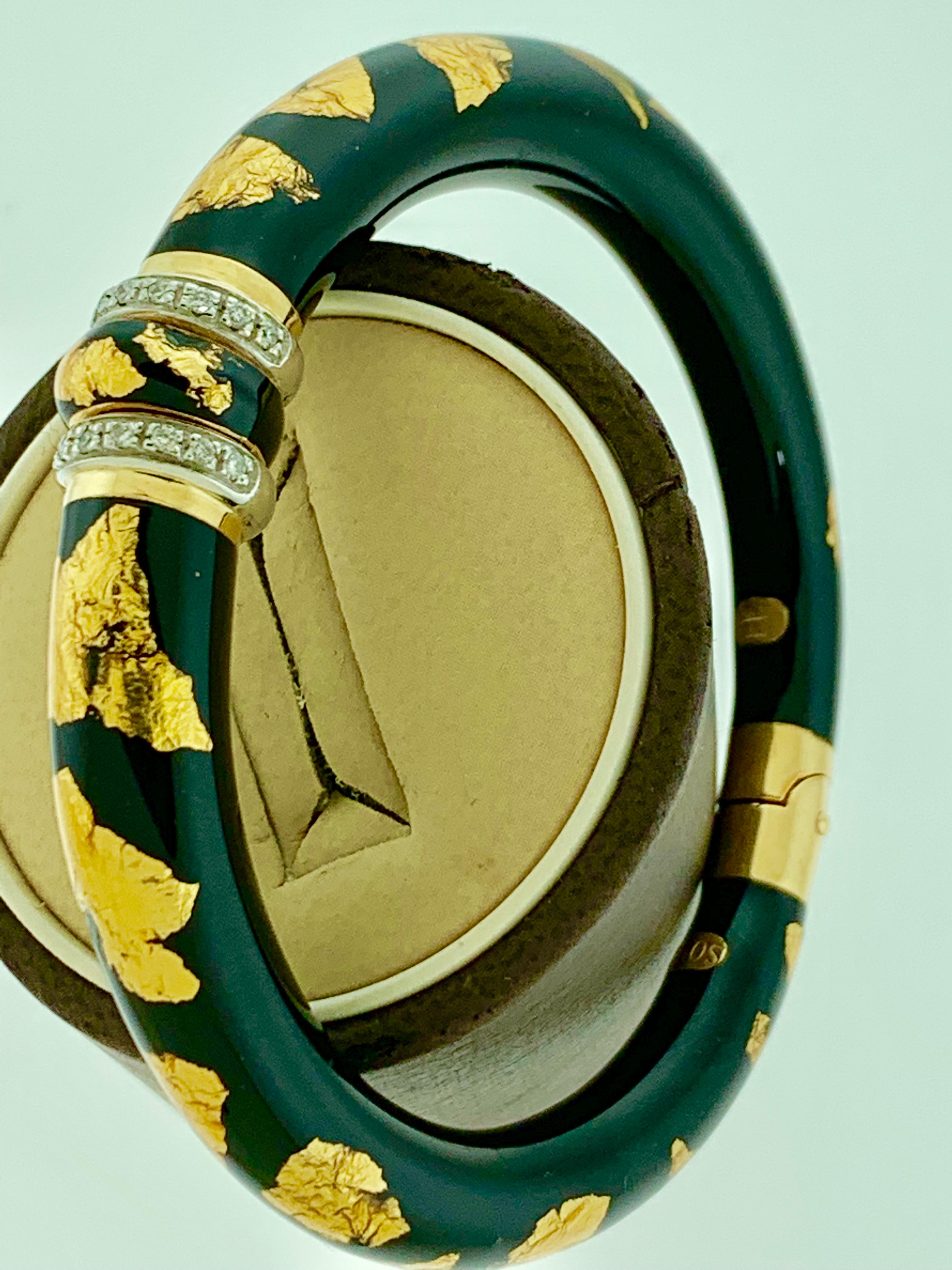 Soho Contemporary 18 Karat Yellow Gold And Diamond And Enamel Bracelet
 Italy and 18 K standard mark to clasp. Excellent condition. 
Diamonds GH color and VS quality
its a cuff which open from the center just by pulling it apart.
Highly fashionable