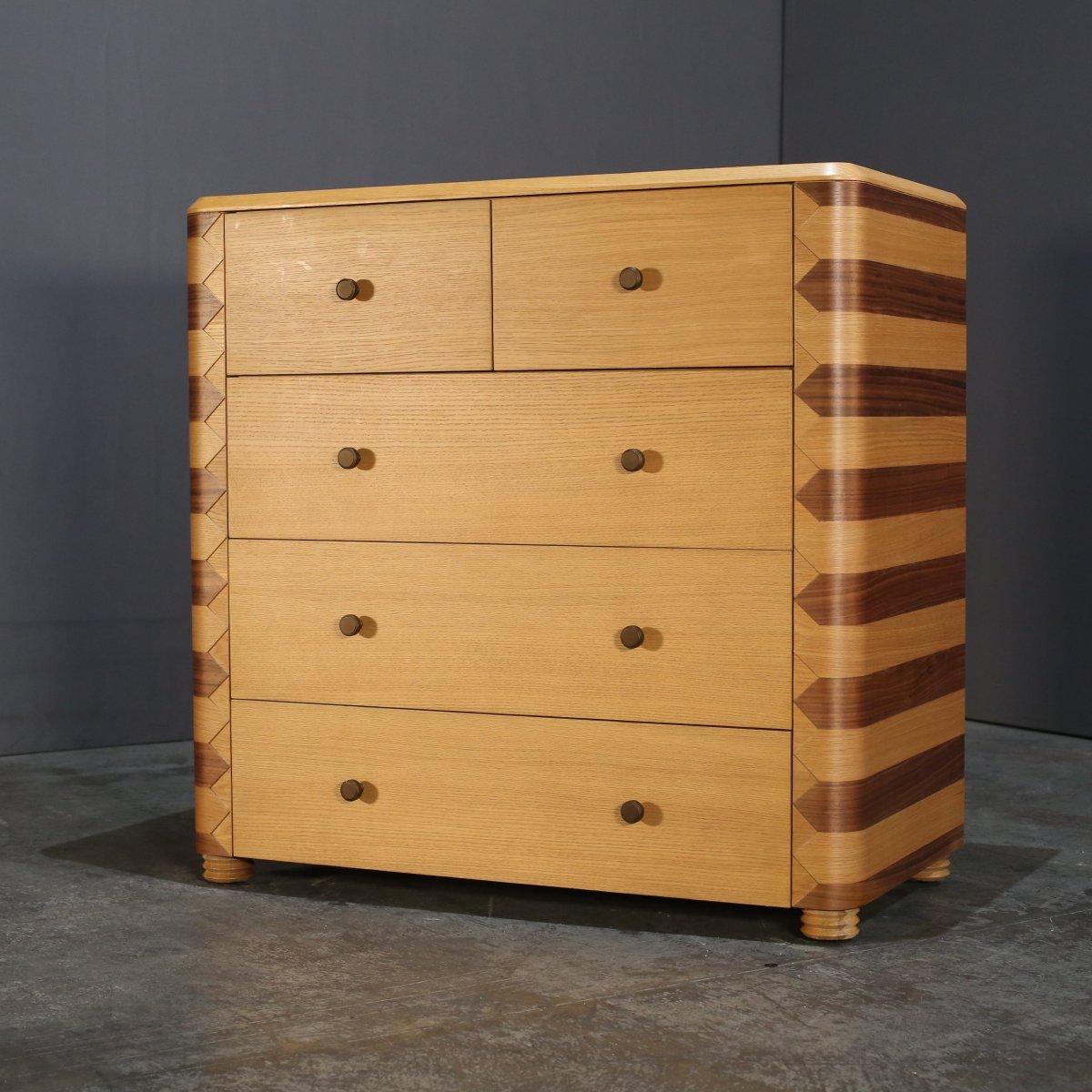 Introducing the Anuel Five Drawer Dresser by Soho Home, a stunning addition to any bedroom. Crafted with the utmost attention to detail, this dresser features five spacious drawers for all your storage needs. The sleek design is complemented by a