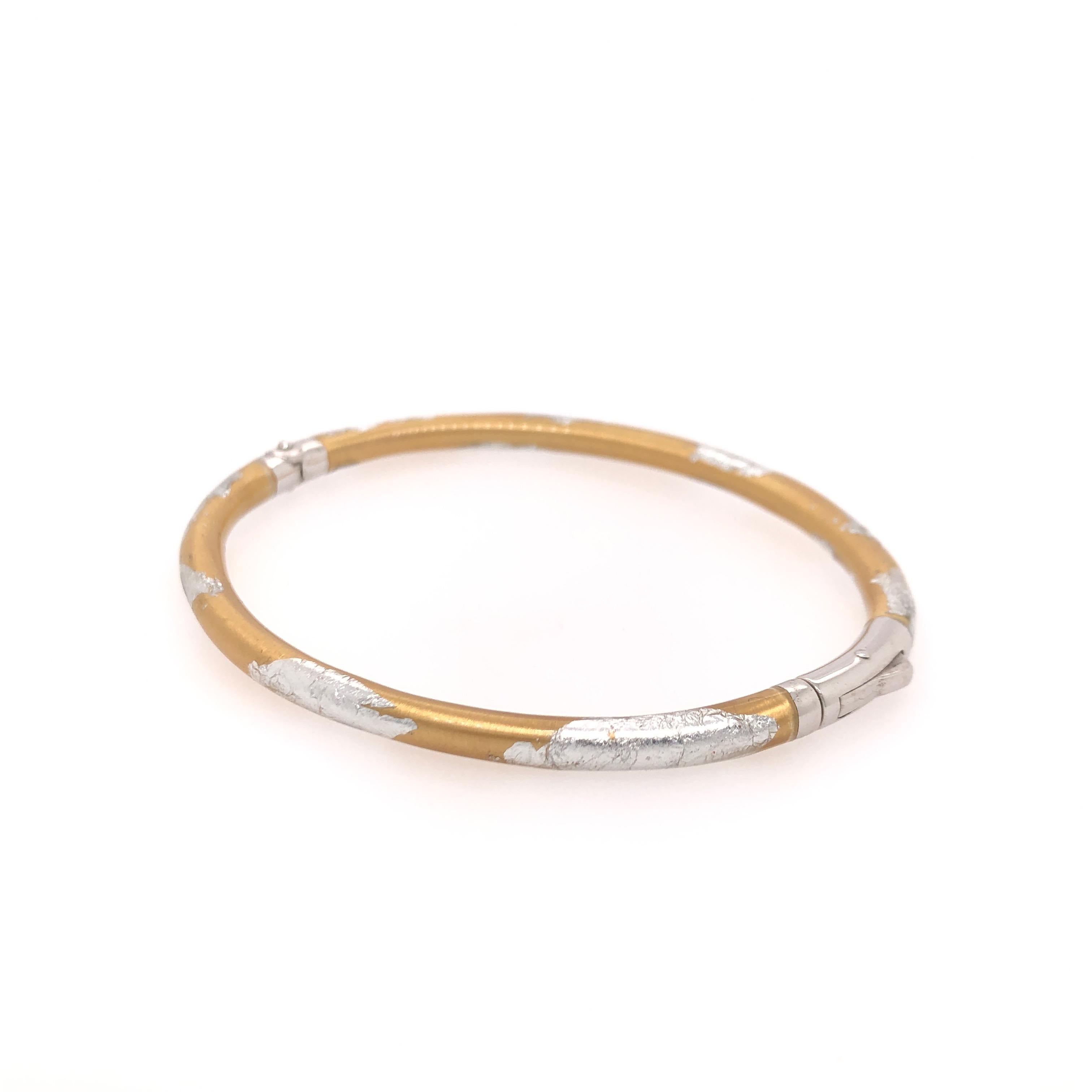 SOHO Silver and Gold Foliage Bangle

Stamped: SOHO, 925, ITALY
