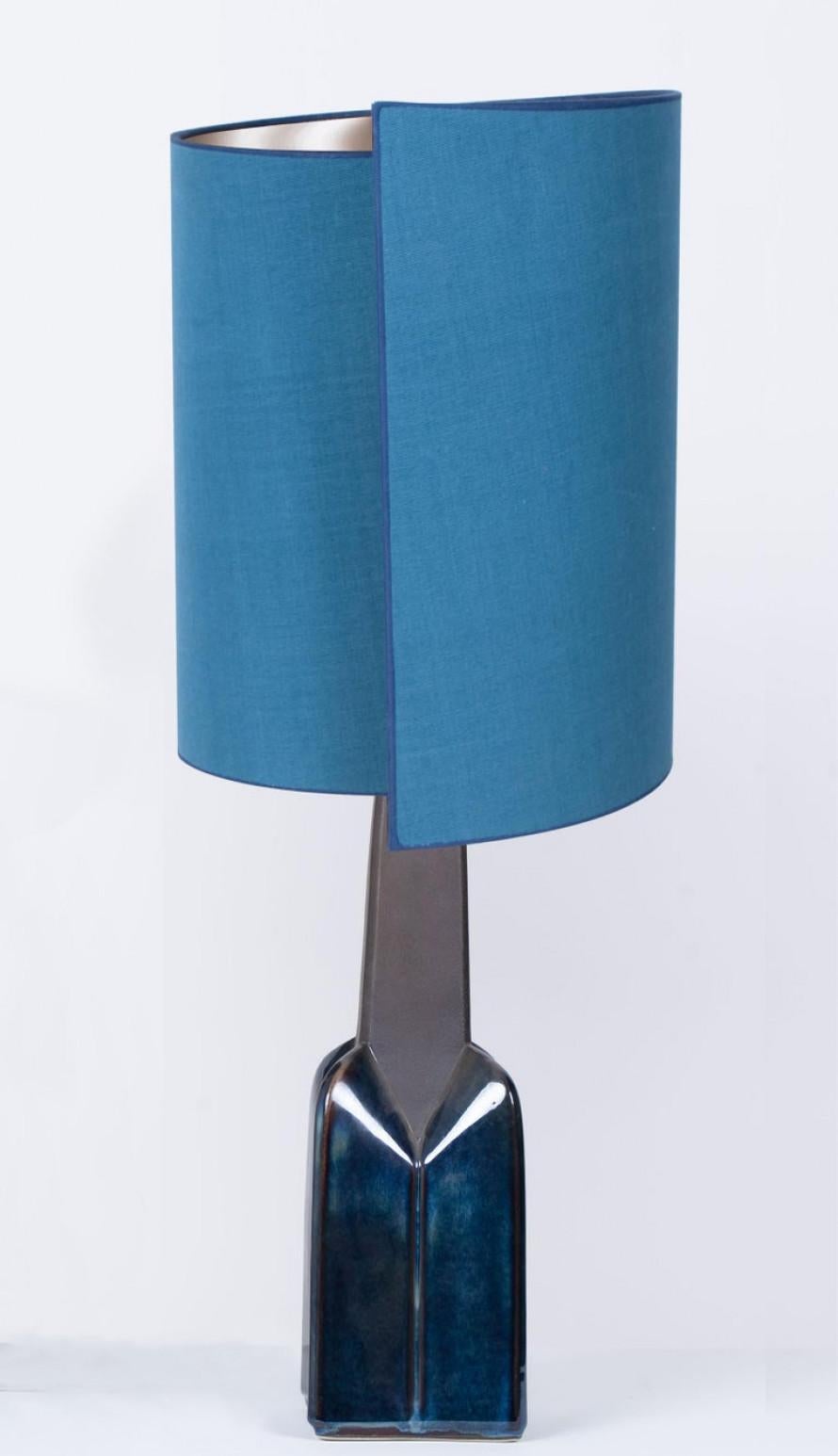 Ceramic table lamp by Soholm, Denmark, 1960s. This high-end sculptural piece is handmade ceramic in blue or grey tones, with a combination of dry and glazed finishes. With a new custom made blue silk lamp shade with warm gold or silver inner-shade