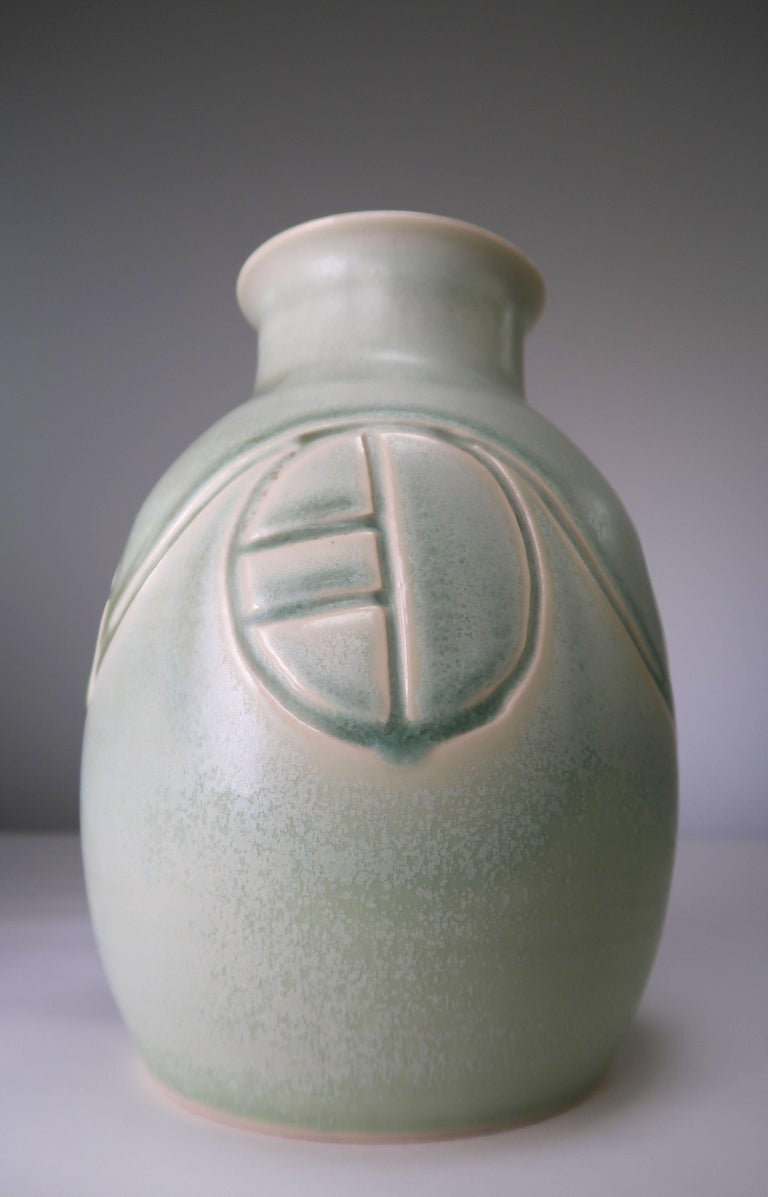 Extremely rare Søholm model. Handmade Danish Mid-Century Modern stoneware vase with mint and aqua green glaze and Minimalist, geometric pattern around the belly. Inside with mint green glaze. Japanese inspiration. Manufactured by Søholm Stentøj on
