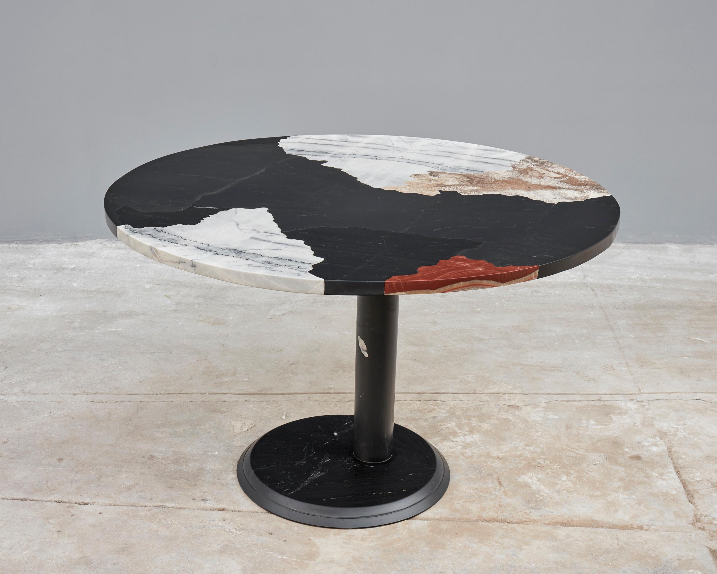 Soil map N°4 table by Estudio Rafael Freyre.
Dimensions: D 120 x H 80 cm. 
Materials: diverse recycled andes stones.

The pieces in the soil map series are part of a quest to bring our bodies closer to the geography we inhabit, to the mineral