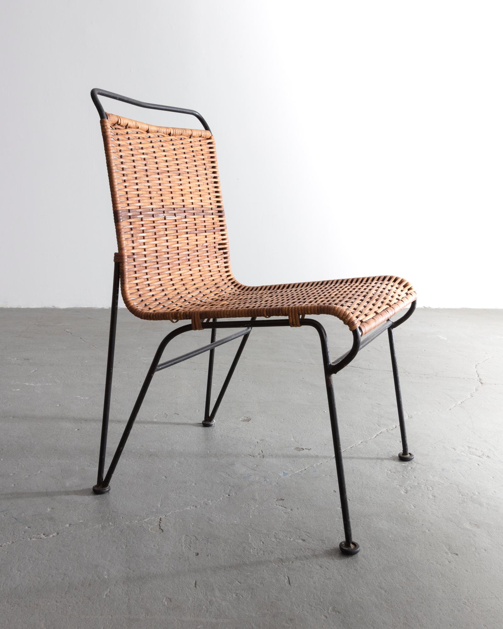 Sol-Air chair with wrought iron frame and original caned seat. Designed by Pipsan Saarinen Swanson, produced by Ficks Reed Company, USA, circa 1950. Iron frame, original caning. A chaise lounge from the same series was exhibited in the inaugural