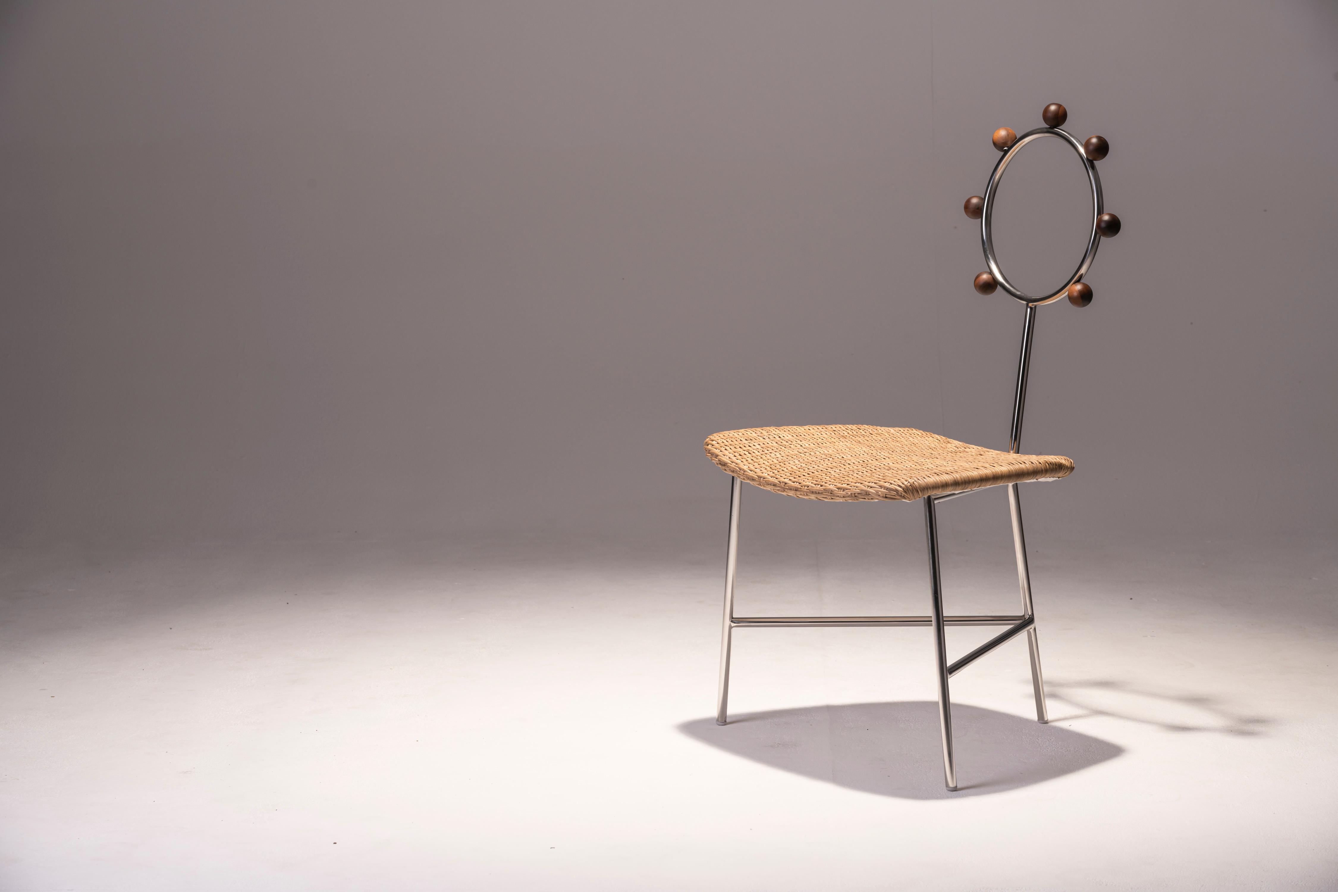 Brazilian SOL minimalist chair handwoven in natural straw and stainless steel For Sale