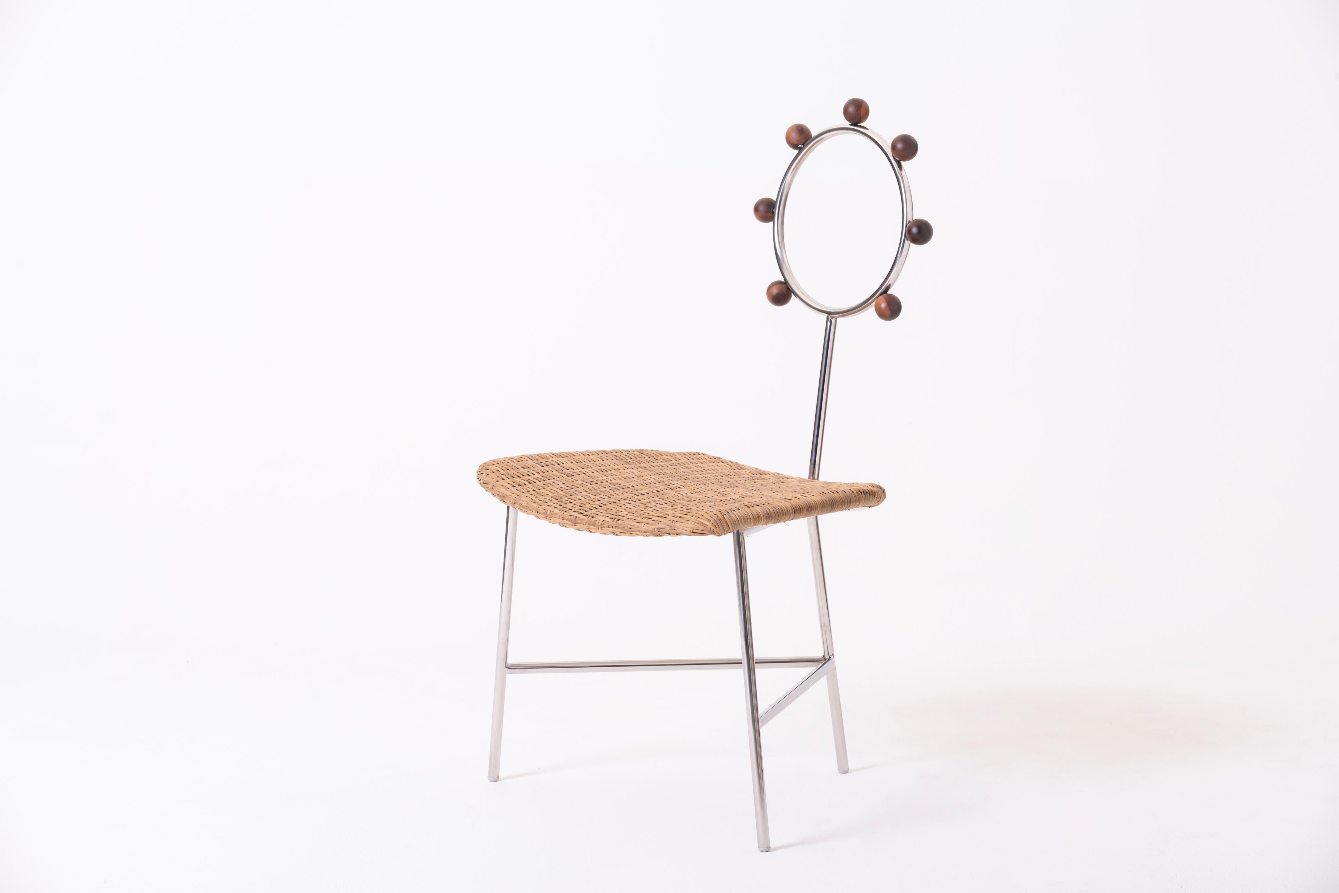 Stainless Steel SOL minimalist chair handwoven in natural straw and stainless steel For Sale