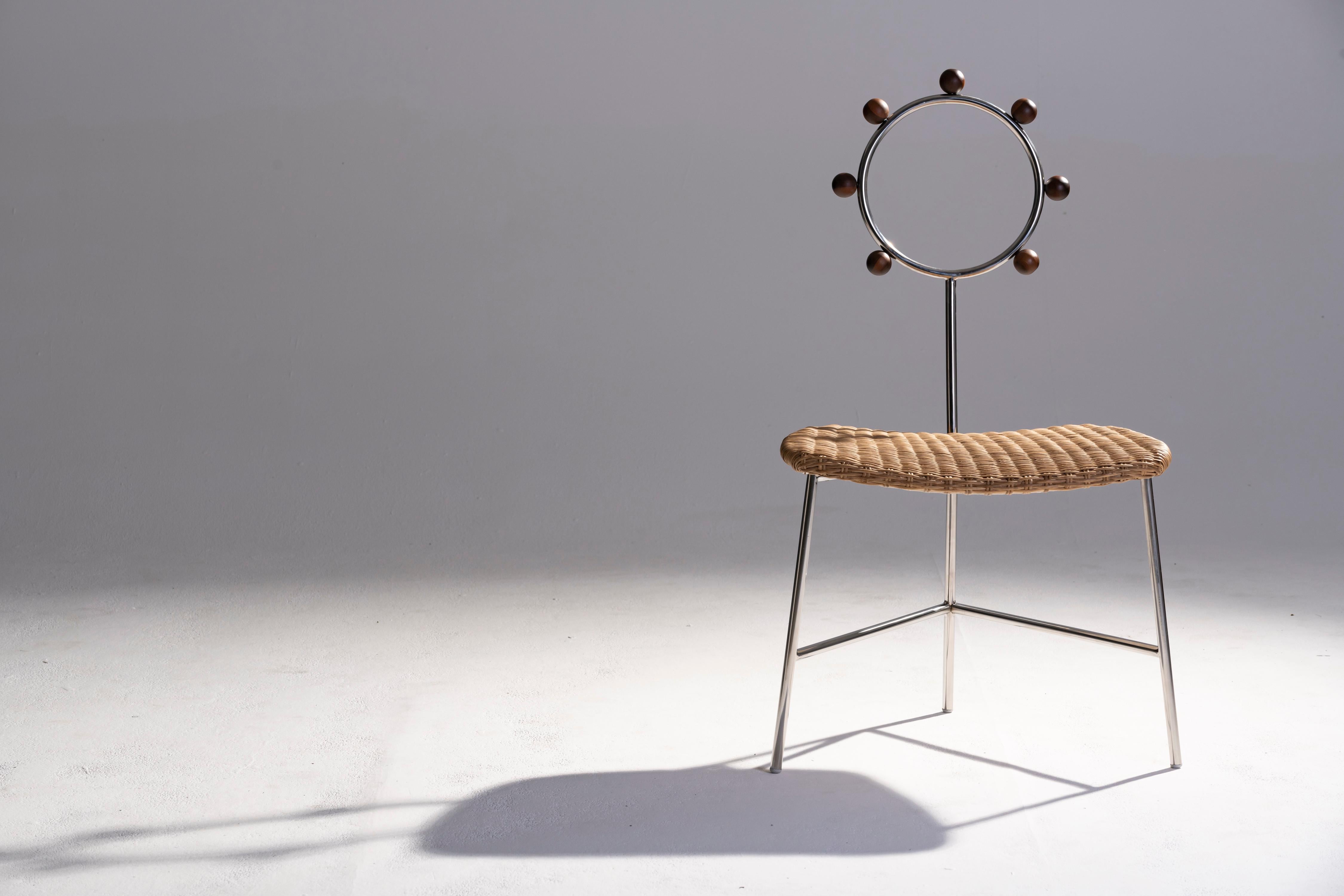 SOL minimalist chair handwoven in natural straw and stainless steel For Sale 2