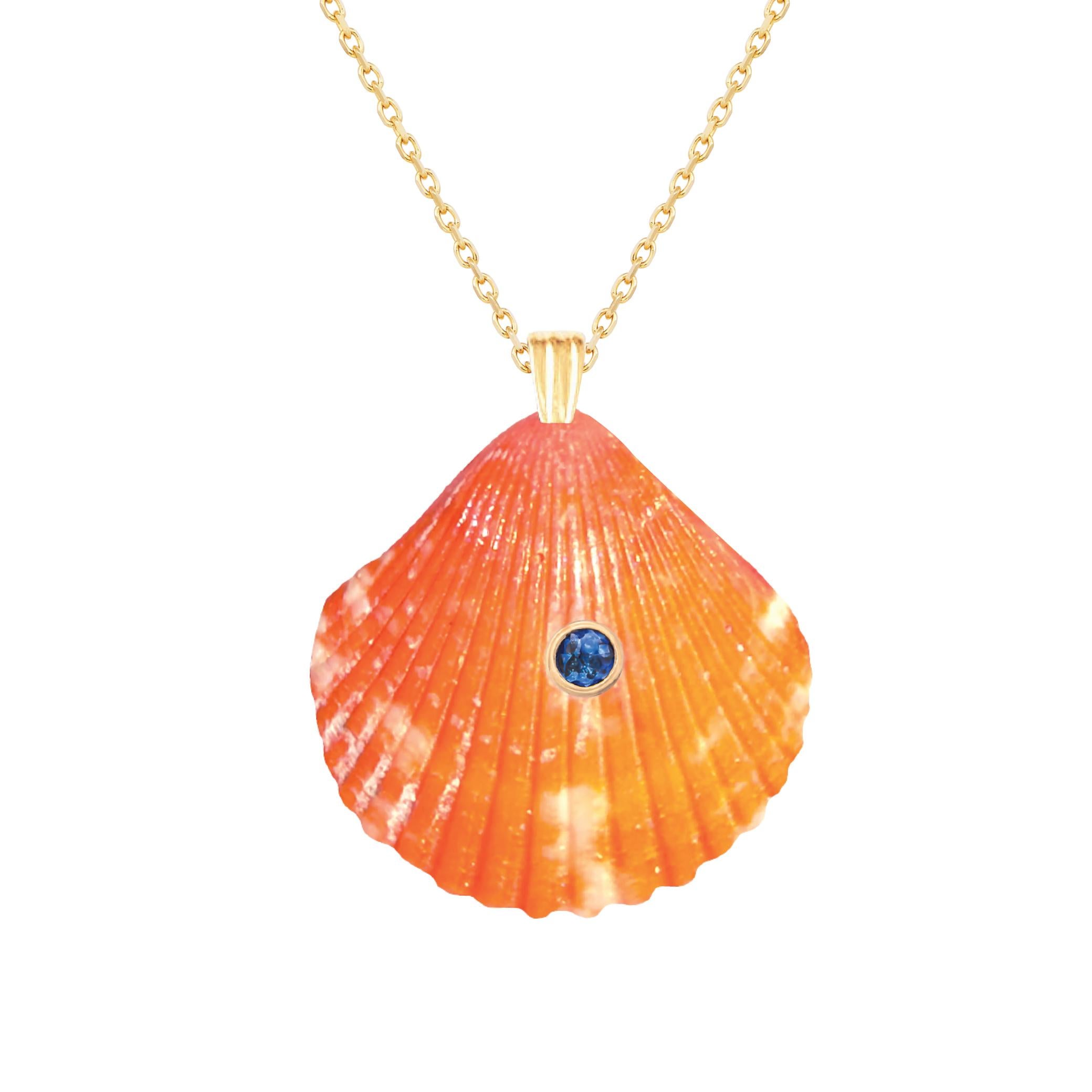 Natural shell pendant with solid 14k gold findings and natural blue sapphire gemstone. Wear this pendant alone or layer it with other gold chains for a beautiful layered effect.  

Order includes one shell pendant, exactly as depicted in primary