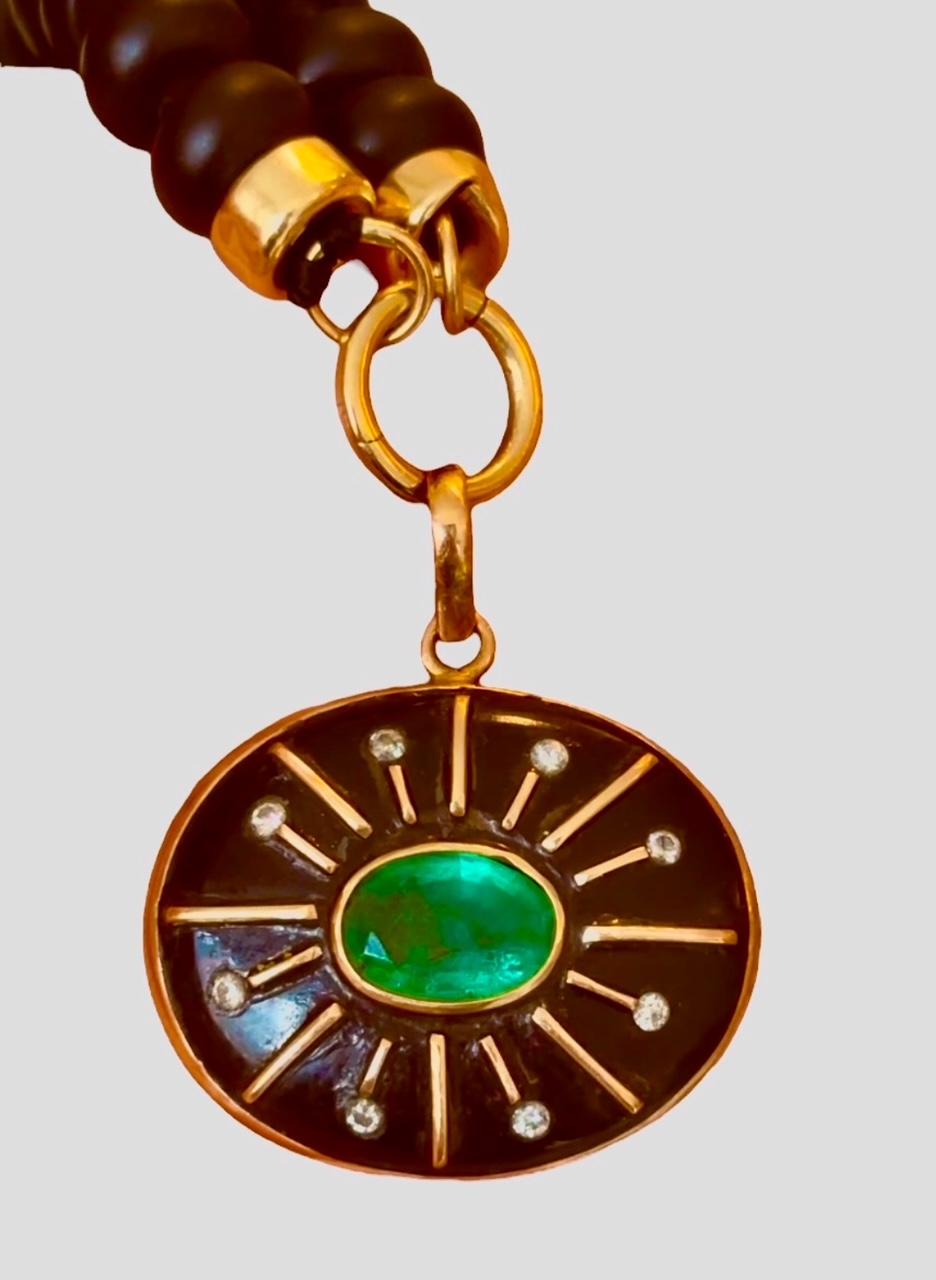 Ciondolo SOL, onice nera, smeraldo, diamanti e oro 14k 1