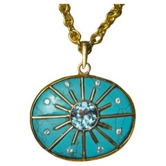 Ciondolo SOL, con turchese, topazio blu, diamanti e oro 14k