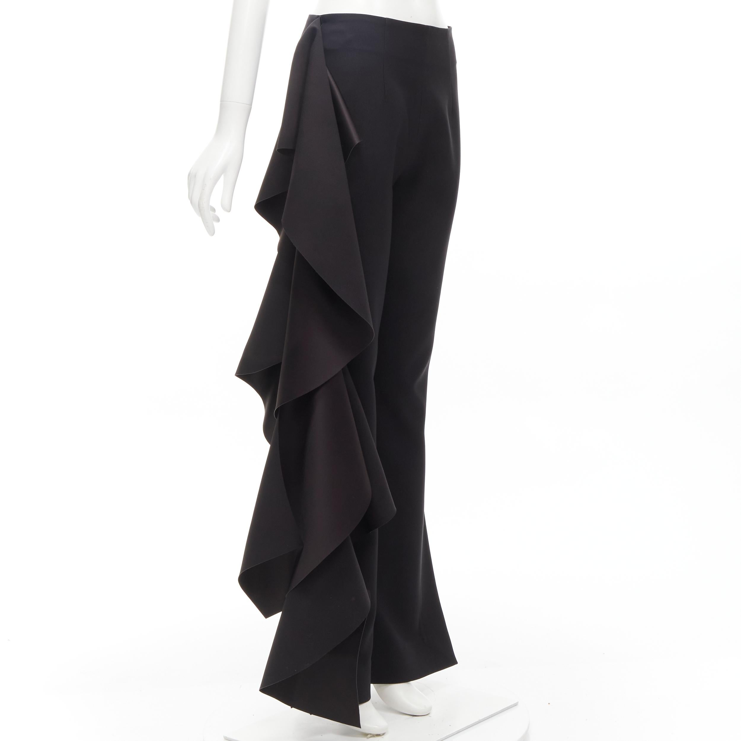 SOLACE black cascade ruffle draped flared trousers pants UK10 US6 M
Brand: Solace London
Material: Polyester
Color: Black
Pattern: Solid
Closure: Zip
Made in: China

CONDITION:
Condition: Excellent, this item was pre-owned and is in excellent