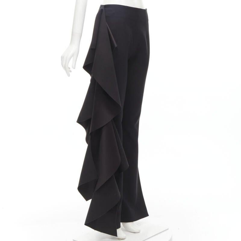 SOLACE black cascade ruffle draped flared trousers pants UK10 US6 M
Reference: KNLM/A00217
Brand: Solace London
Material: Polyester
Color: Black
Pattern: Solid
Closure: Zip
Made in: China

CONDITION:
Condition: Excellent, this item was pre-owned and