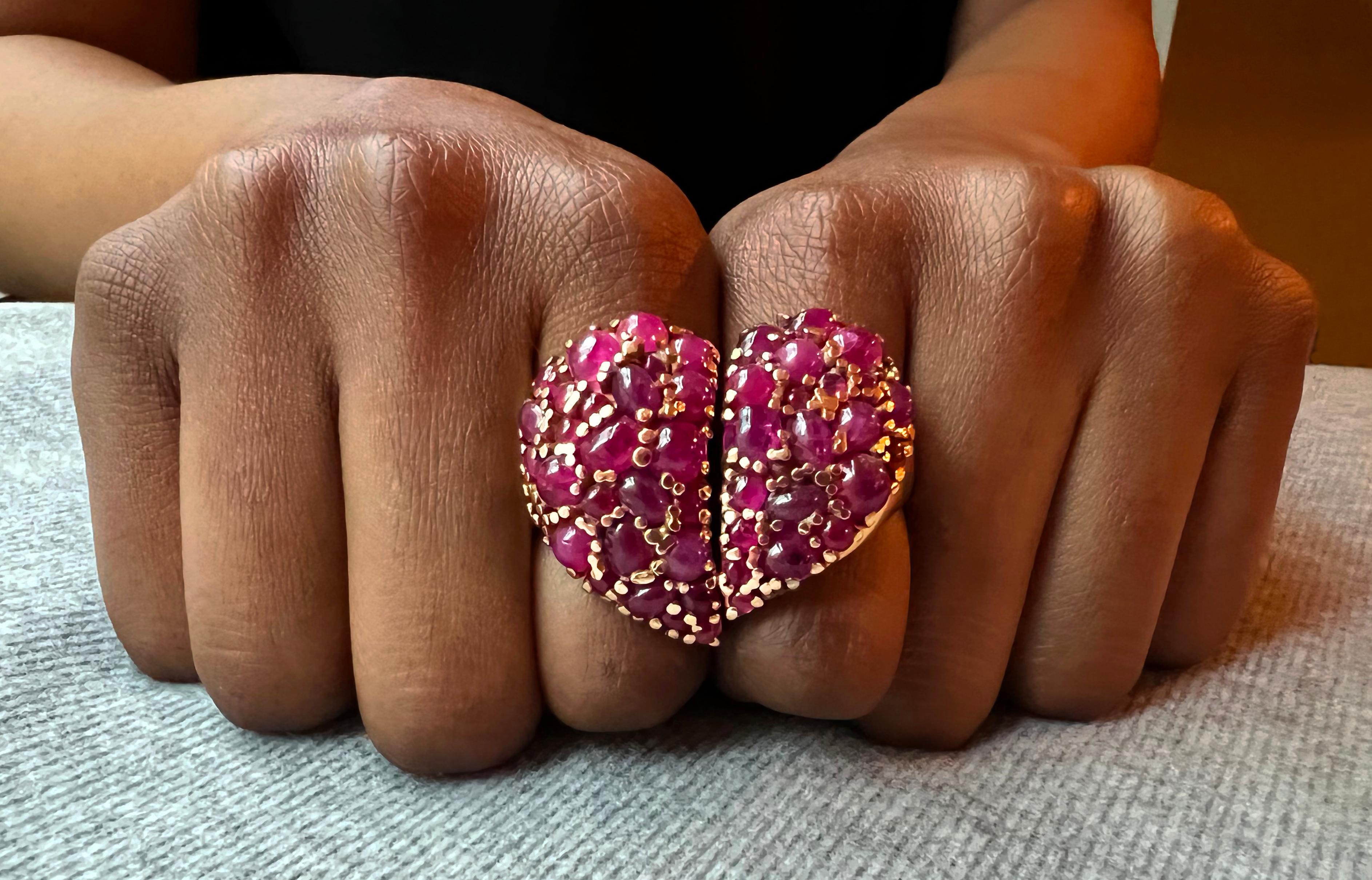 A cabochon ruby and 18 karat yellow gold double finger ring, by Solange Azagury-Partridge, 2002. This is an unforgettable ring, very rarely available, and surprisingly easy to wear. While Solange chose to call it a 