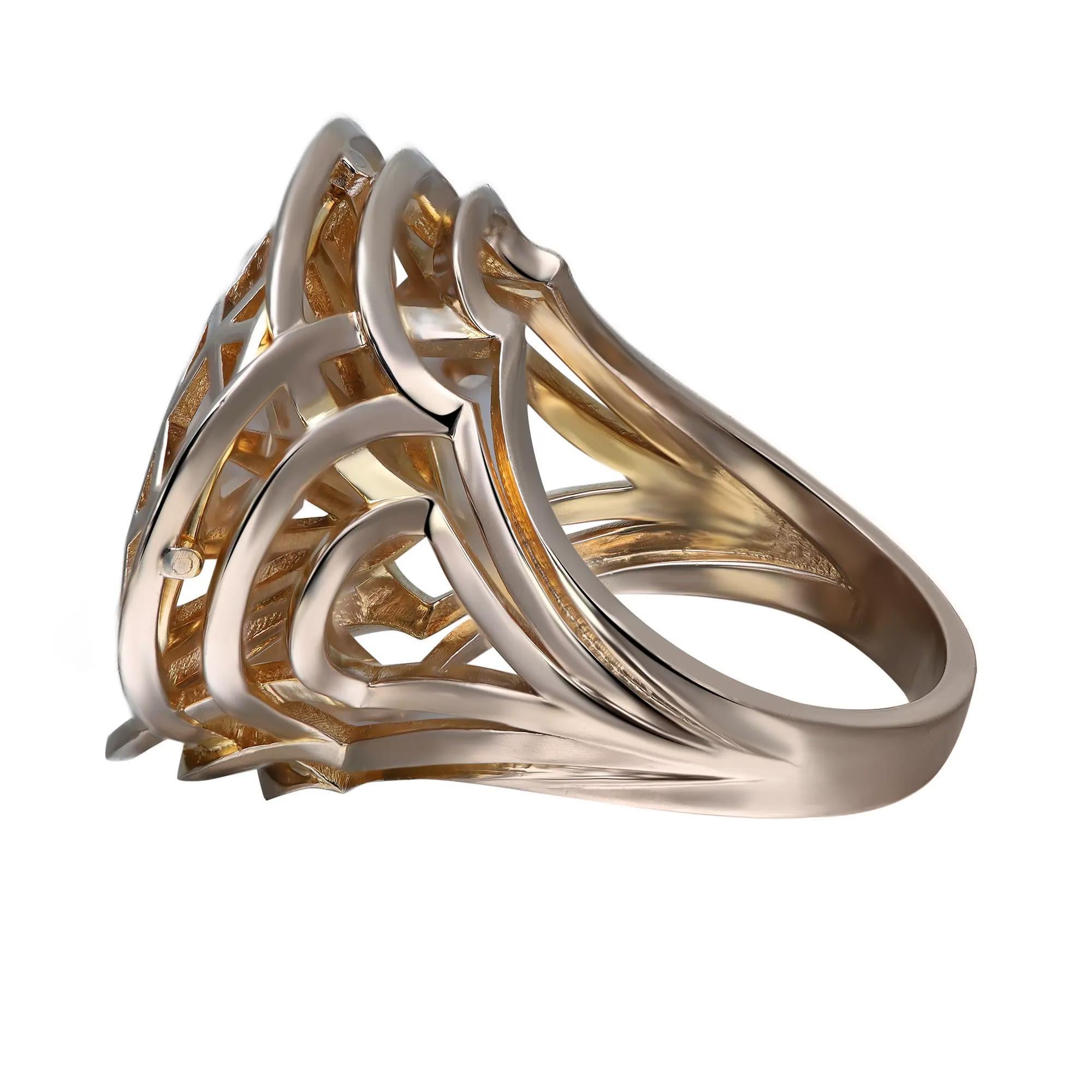 Bold and beautiful, this Solange Azagury Partridge cocktail ring is a standout addition to your jewelry collection. Featuring a crisscross geometric web design crafted in fine 18K yellow gold. Ring size: 6.5. Total weight: 13.15 grams. Excellent