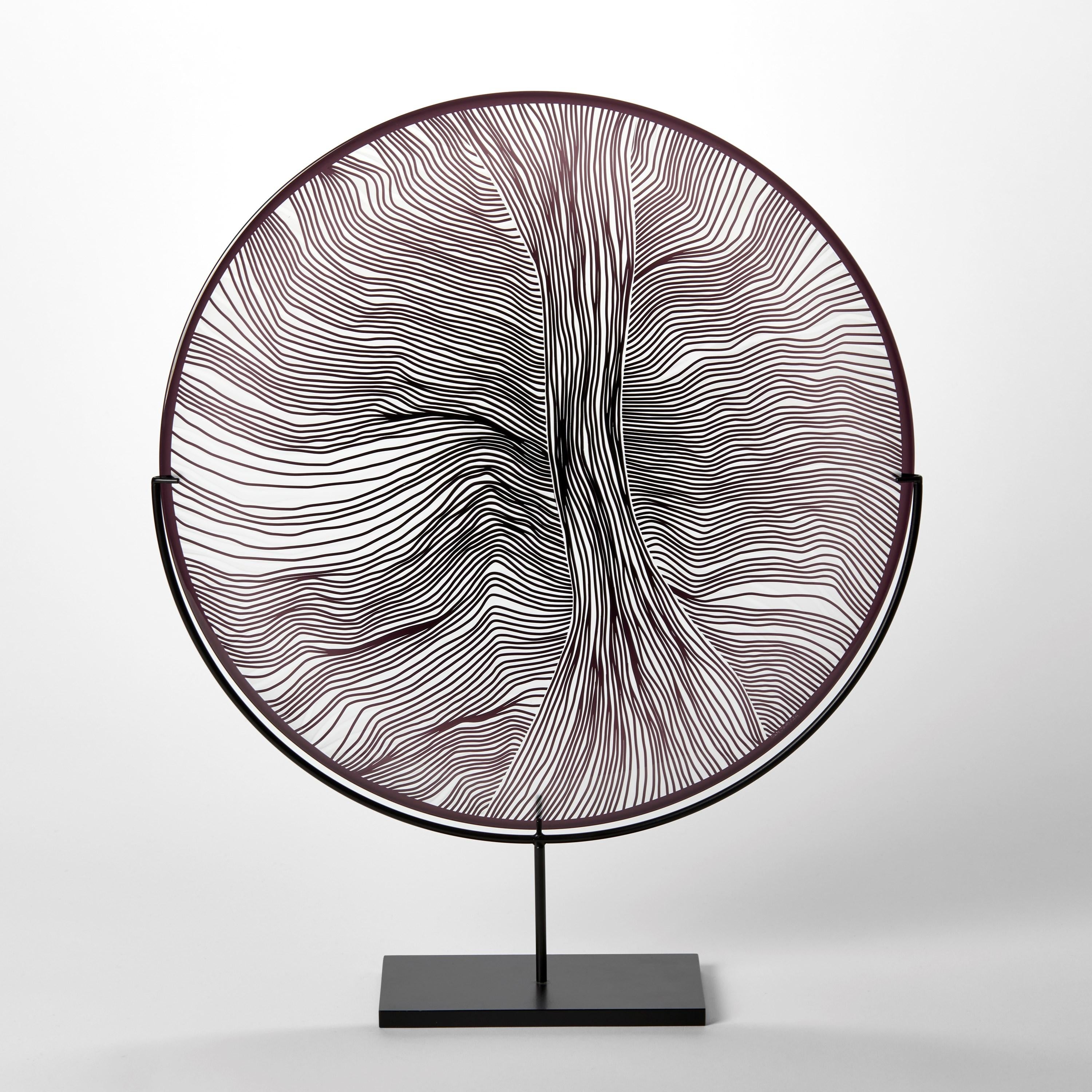 'Solar Storm Monochrome III' is a unique handblown and cut glass artwork by the British artist, Kate Jones of Gillies Jones.

Created with Stephen Gillies, with whom Jones makes many works in collaboration, these exquisite sculptural plates are