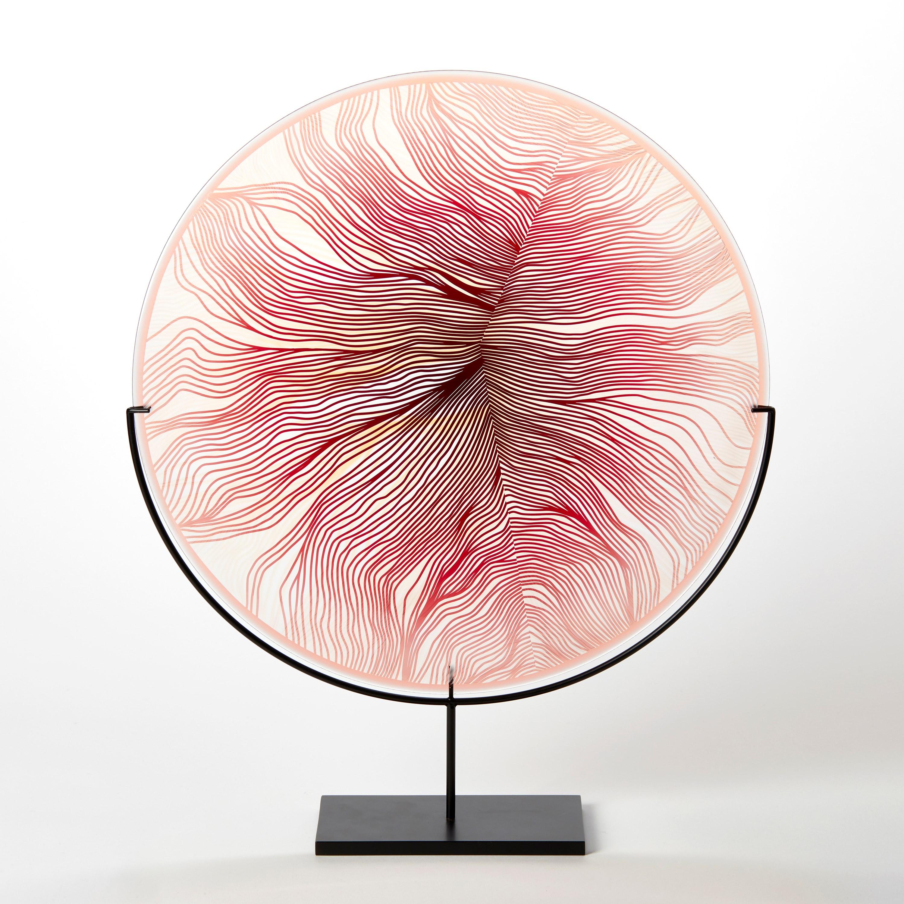 'Solar Storm Ruby Red over Gold' is a unique handblown and cut glass artwork by the British artist, Kate Jones of Gillies Jones.

In the artist's own words:

“This new body of work references both the evident structure of the landscape and the vast
