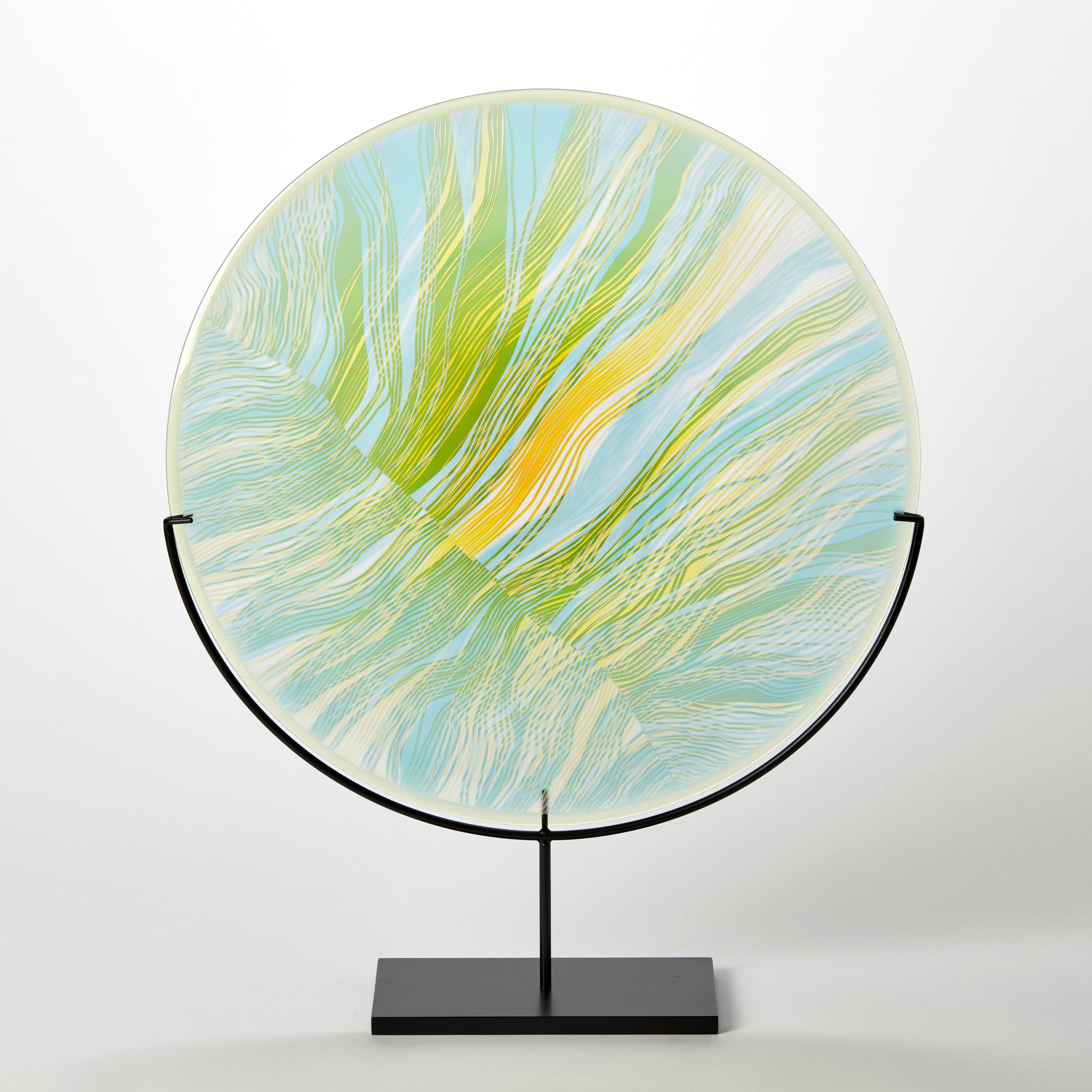 'Solar Storm Sky Blue over Gold' is a unique handblown and cut glass artwork by the British artist, Kate Jones of Gillies Jones.

In the artist's own words:

“This new body of work references both the evident structure of the landscape and the vast