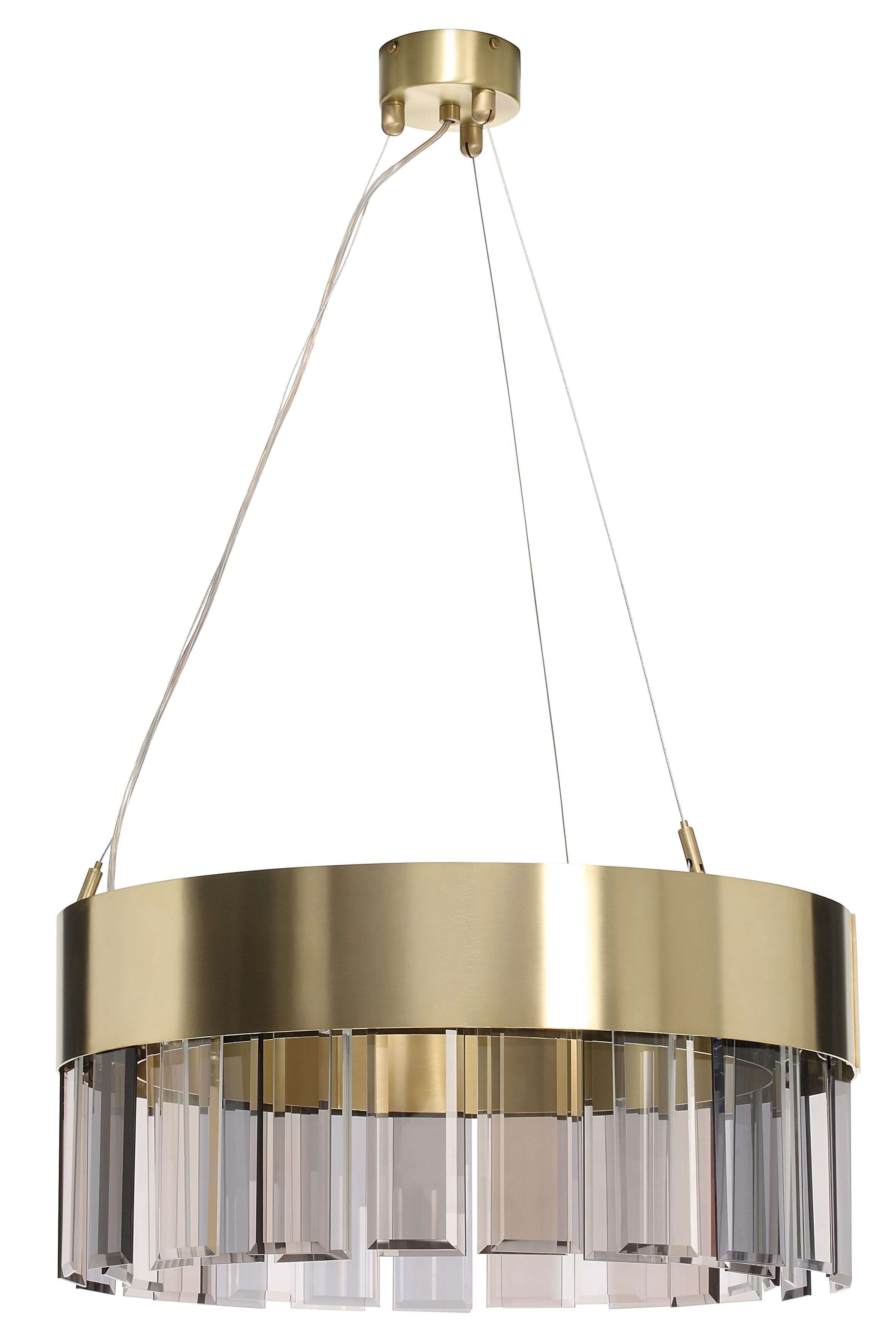Solaris 500 pendant by CTO Lighting
Materials: satin brass with cut glass drops and stainless steel suspension wire/clear flex
Dimensions: H 25 x W 50 cm 

All our lamps can be wired according to each country. If sold to the USA it will be wired