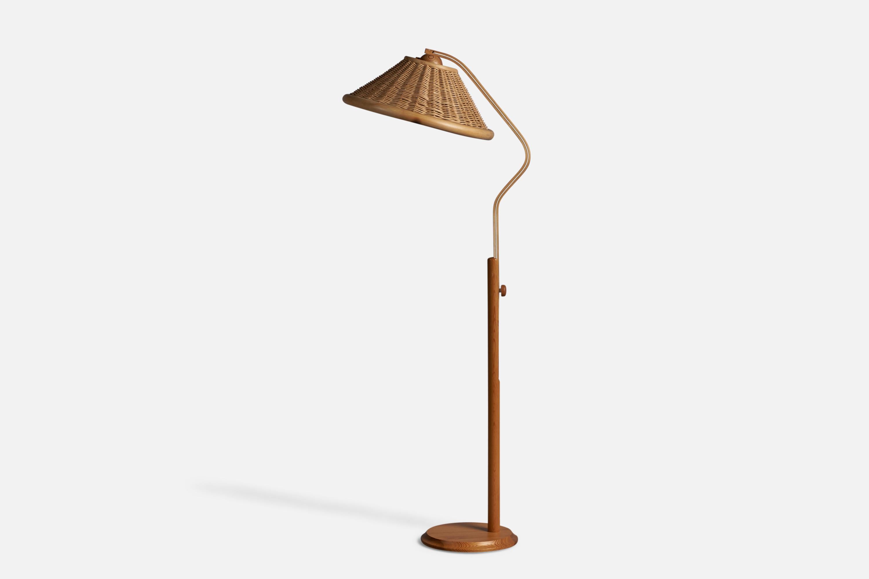 An adjustable pine, bentwood, bamboo and rattan floor lamp, designed and produced by Solbackens Svarveri, Sweden, c. 1970s.

Overall Dimensions (inches): 57