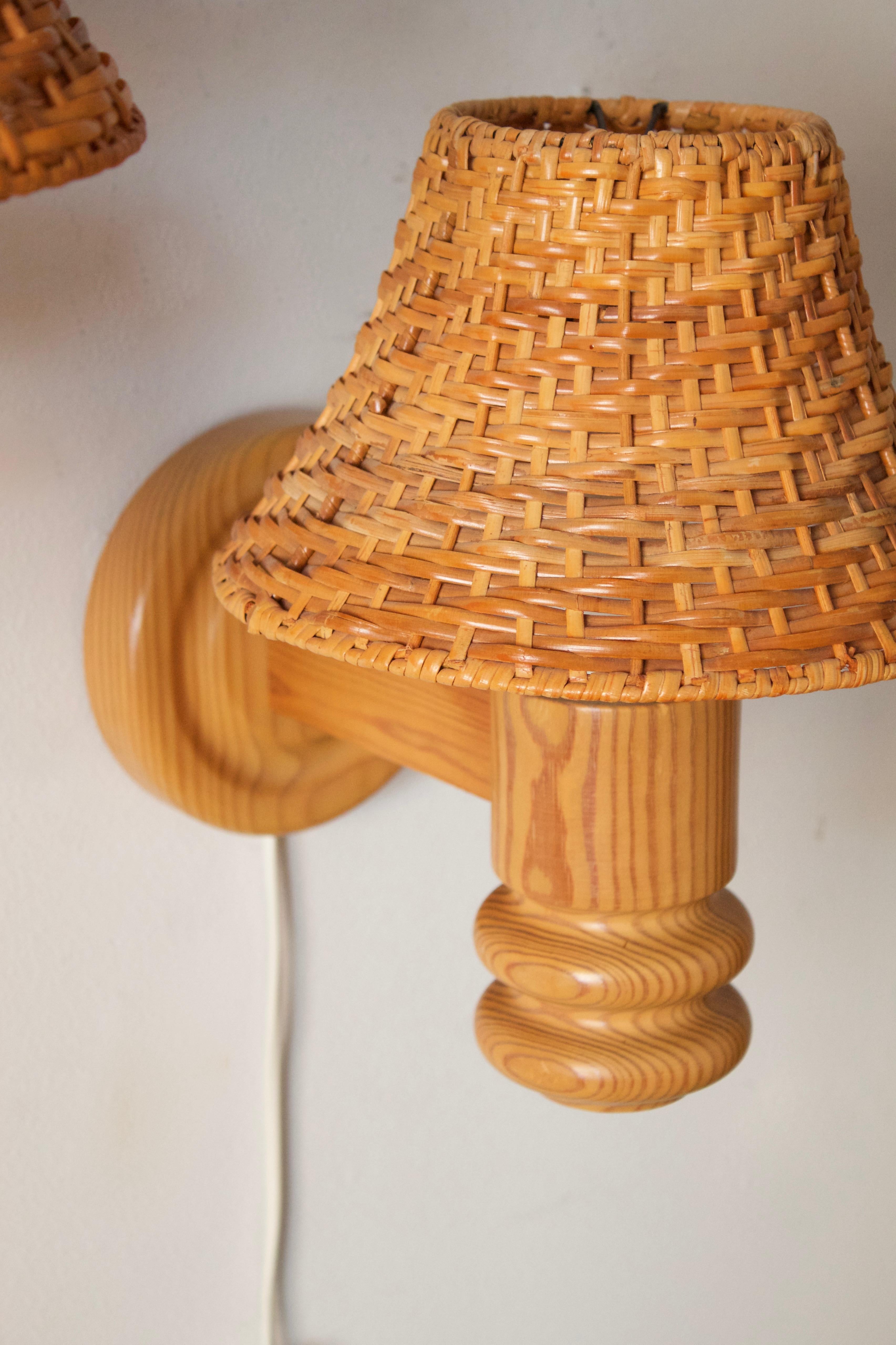 Solbackens Svarveri, Minimalist Wall Lights, Turned Pine, Rattan, Sweden, 1970s In Good Condition In High Point, NC