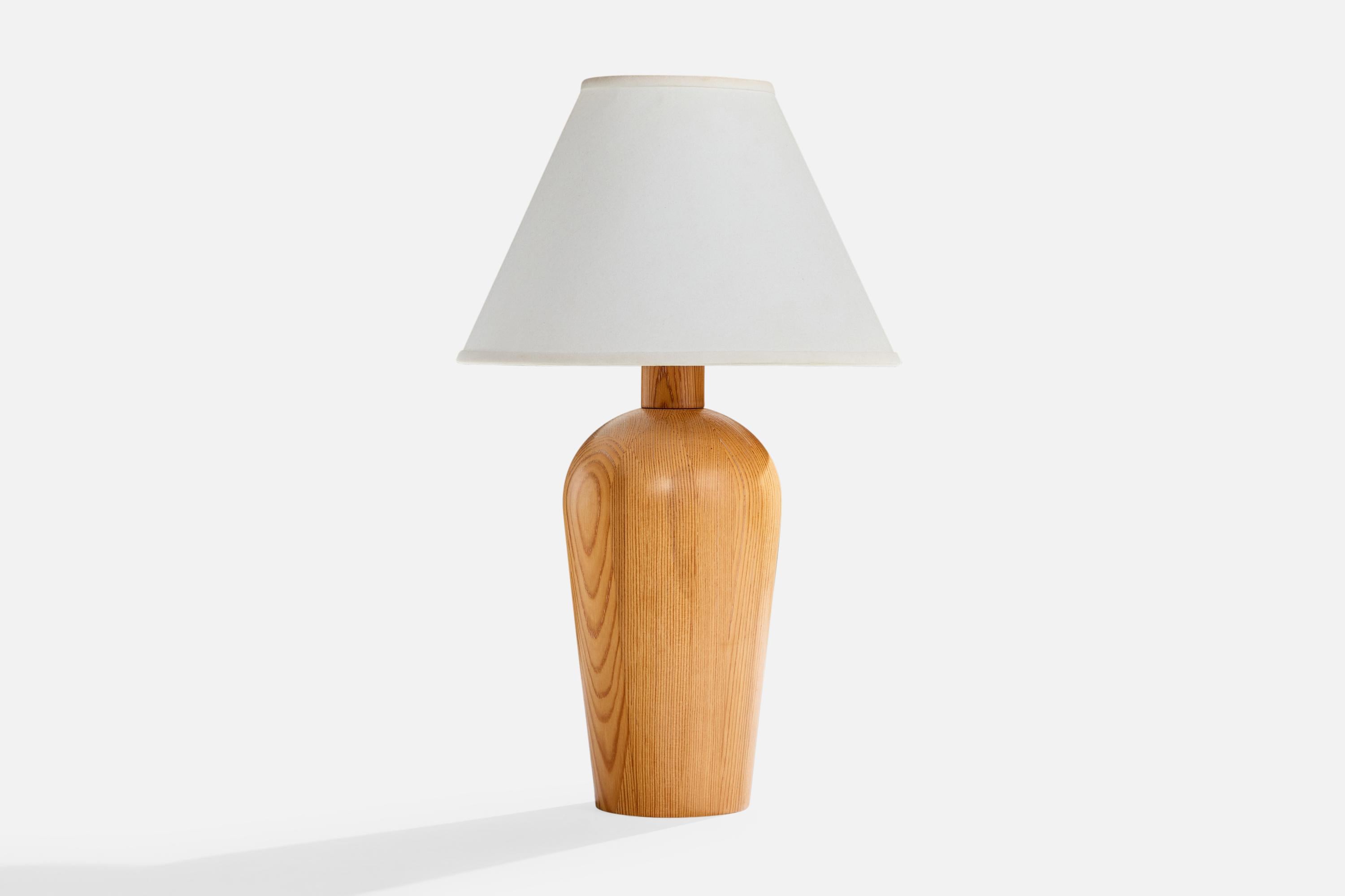 A pine table lamp produced by Solbackens Svarveri, Sweden, c. 1980s.

Dimensions of Lamp (inches): 15