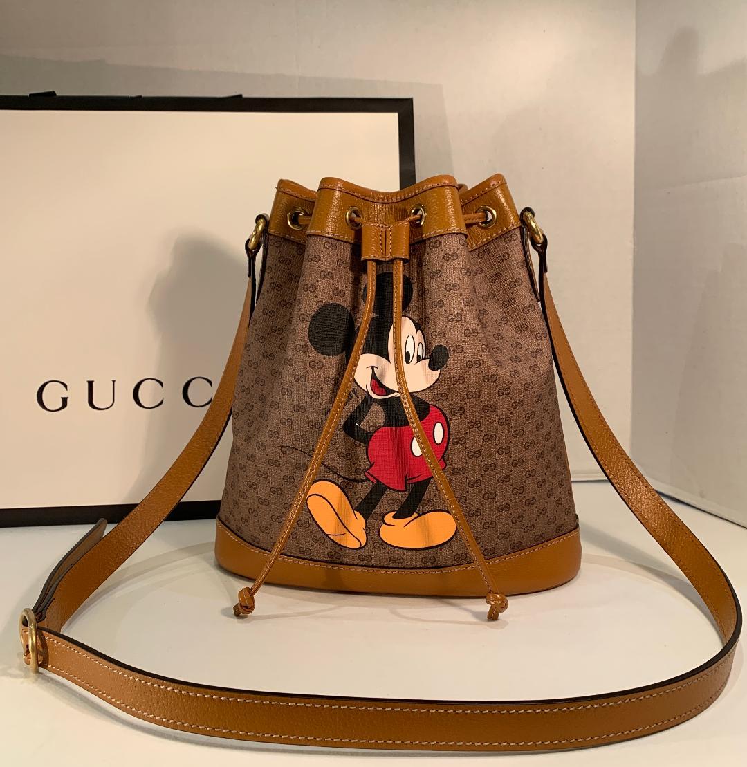 To celebrate the Year of the Rat, Gucci collaborated with Disney (specifically Mickey Mouse) to deliver this very collectible capsule collection. Gucci's iconic GG pattern has been given a Mickey-approved flip!

Get this SOLD OUT Gucci bag that