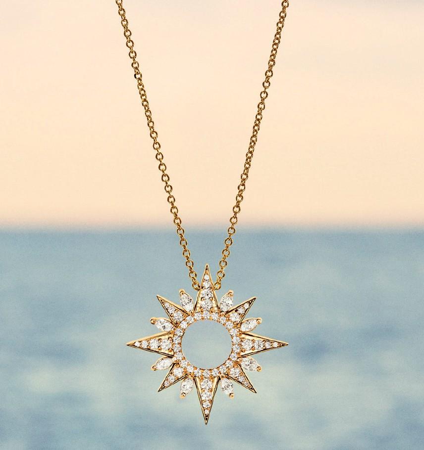 Soleil 14K Yellow Gold Pendant with Cable Chain by Made by Malyia.

This brilliant, diamond-inlaid solar pendant captures both a sense of joy and the thrill of exploration. The message? Follow the sun.

Diamond Weight: 1.25 CTTW - Round and Marquise
