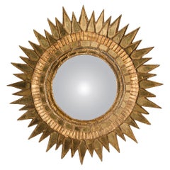 A giltwood and resin Mirror in the Manner of Line Vautrin