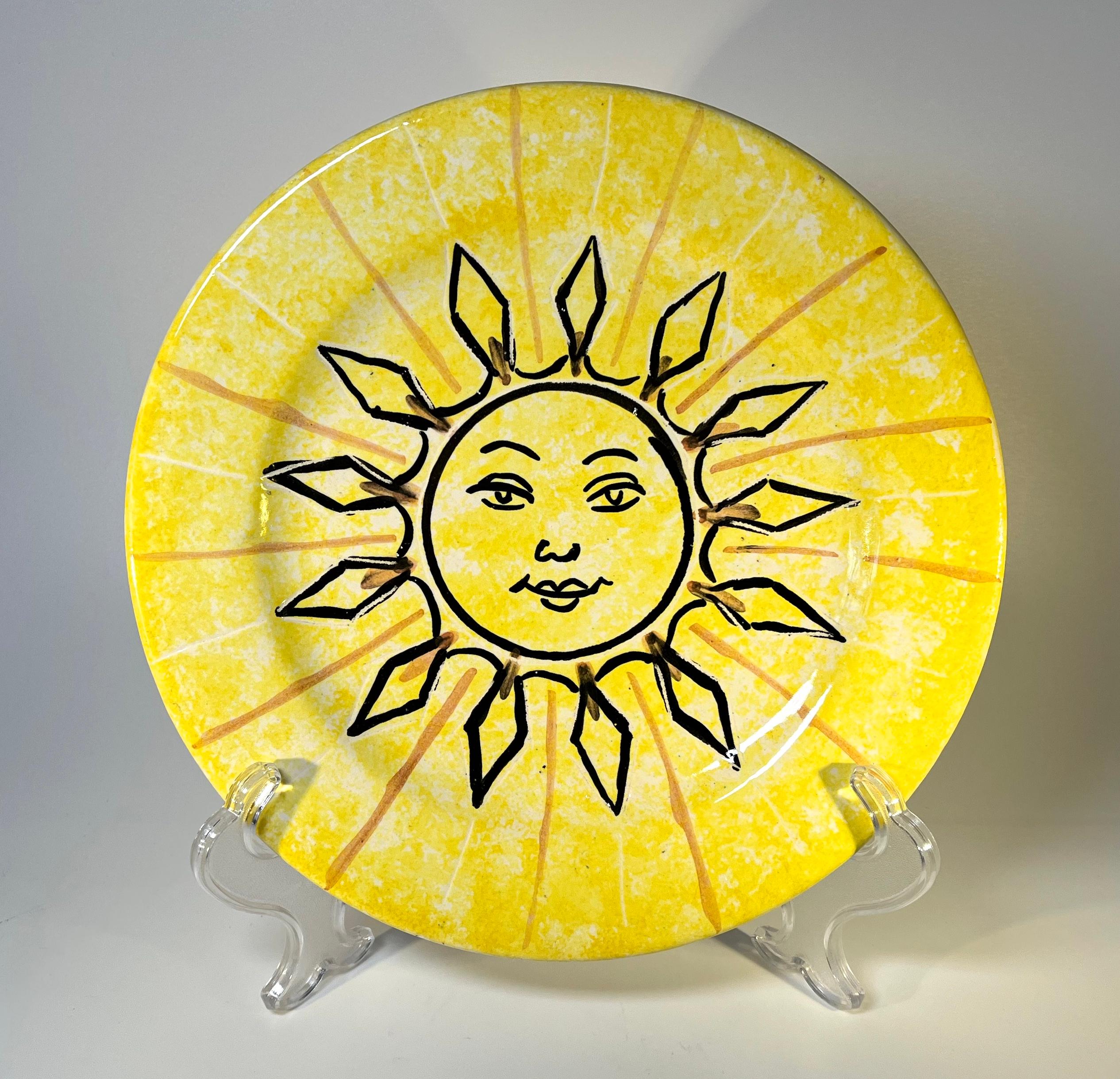 Soleil glazed ceramic hand painted decorative plate by Vallauris, France. Circa 1960's
Signed Vallauris
Measures: Height 5.5 inch, diameter 9.5 inch
In very good condition. Minor under glaze paint splatter
Wear consistent with age and use.