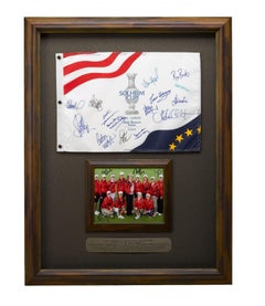 Foto firmata e bandiera delle partite di Solheim Cup della squadra statunitense ed europea, 2009