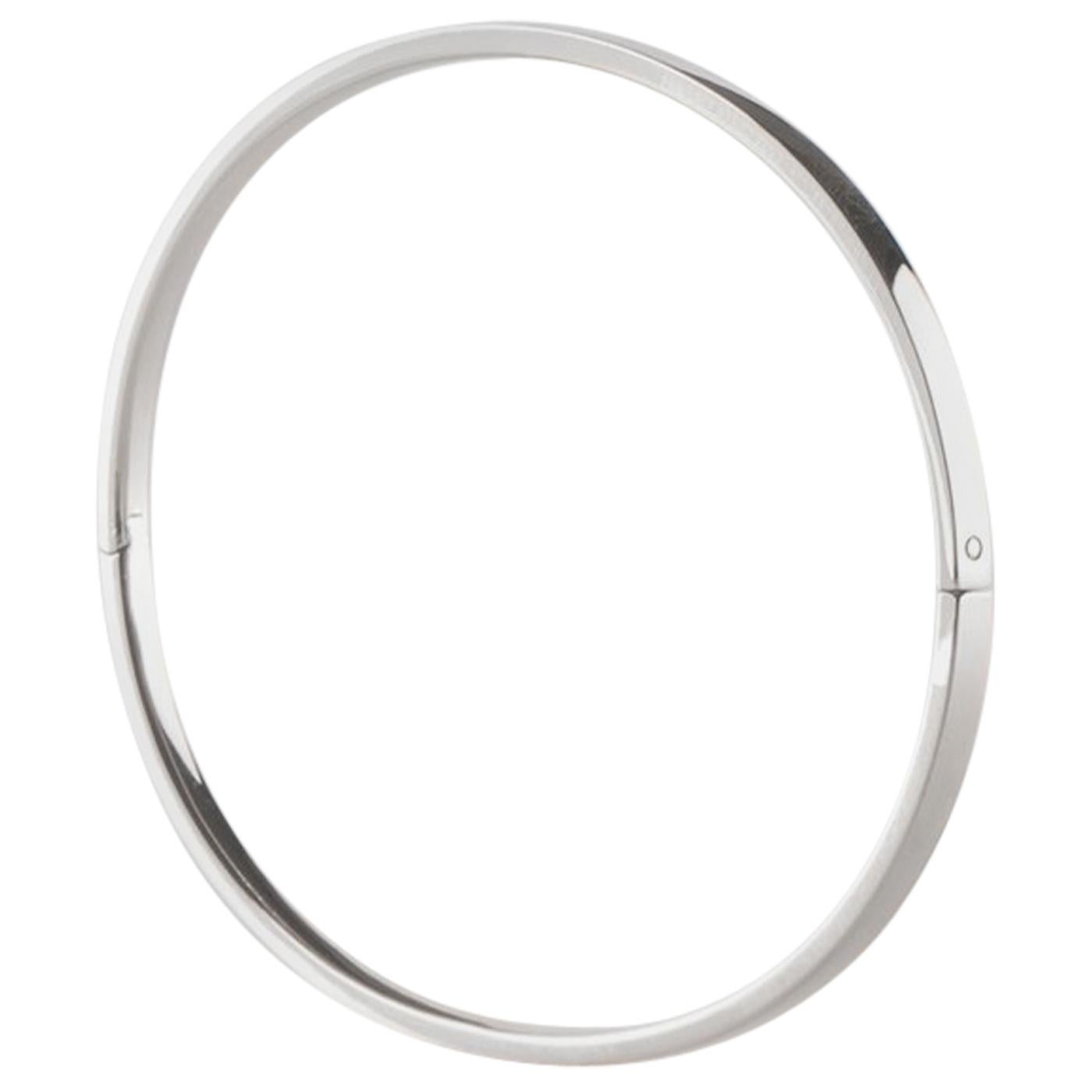 Solid 14 Karat White Gold Closed Bangle Bracelet  For Sale