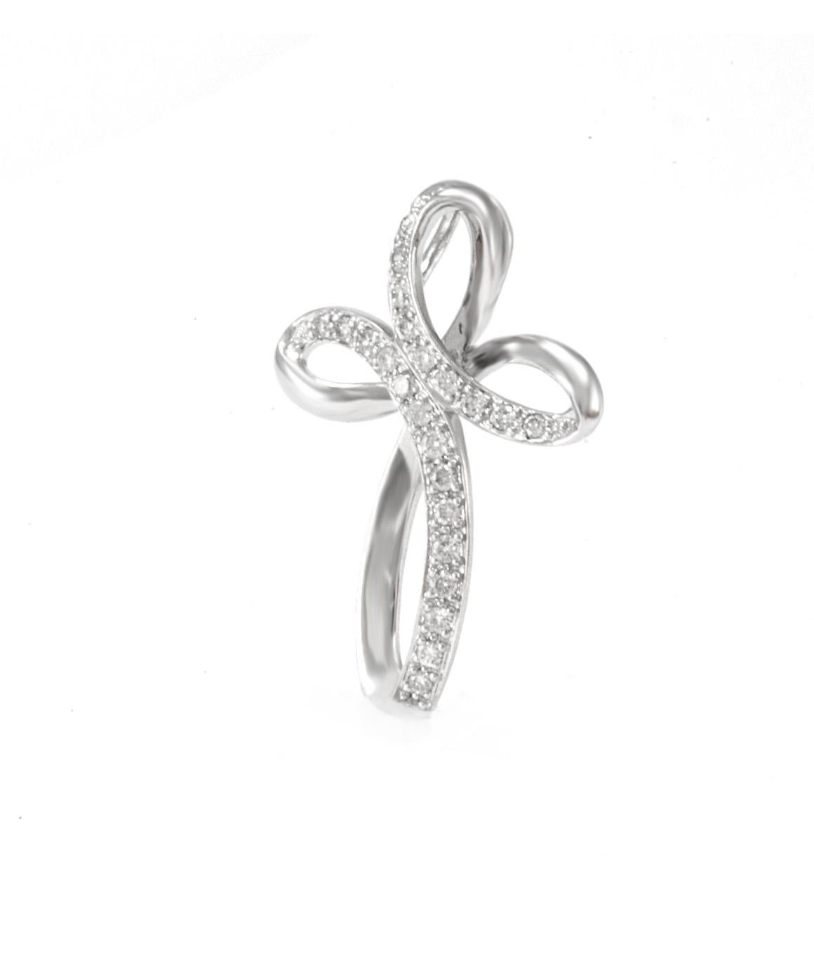 Solid 14K White Gold Natural Diamond Cross Pendant Excellent Condition! This pendant weighs 2.3 grams, and measures about 1 x .75 inches. There are 24 natural diamonds on this cross, measuring approximately 0.34cttw. Please see photos for details!