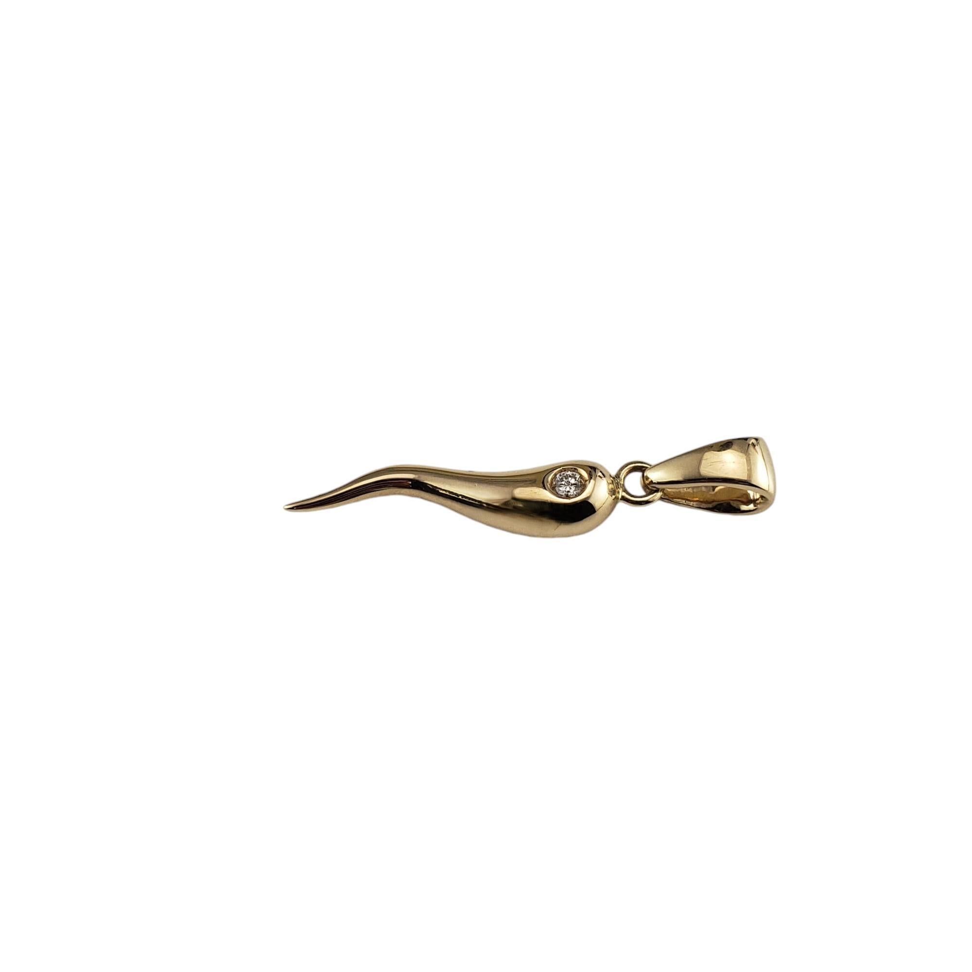 14 Karat Yellow Gold and Diamond Italian Horn Charm

The Italian horn, or cornicello, is said to protect against the evil eye and bring the wearer good luck and fortune.

This lovely charm is accented with one round brilliant cut diamond set in