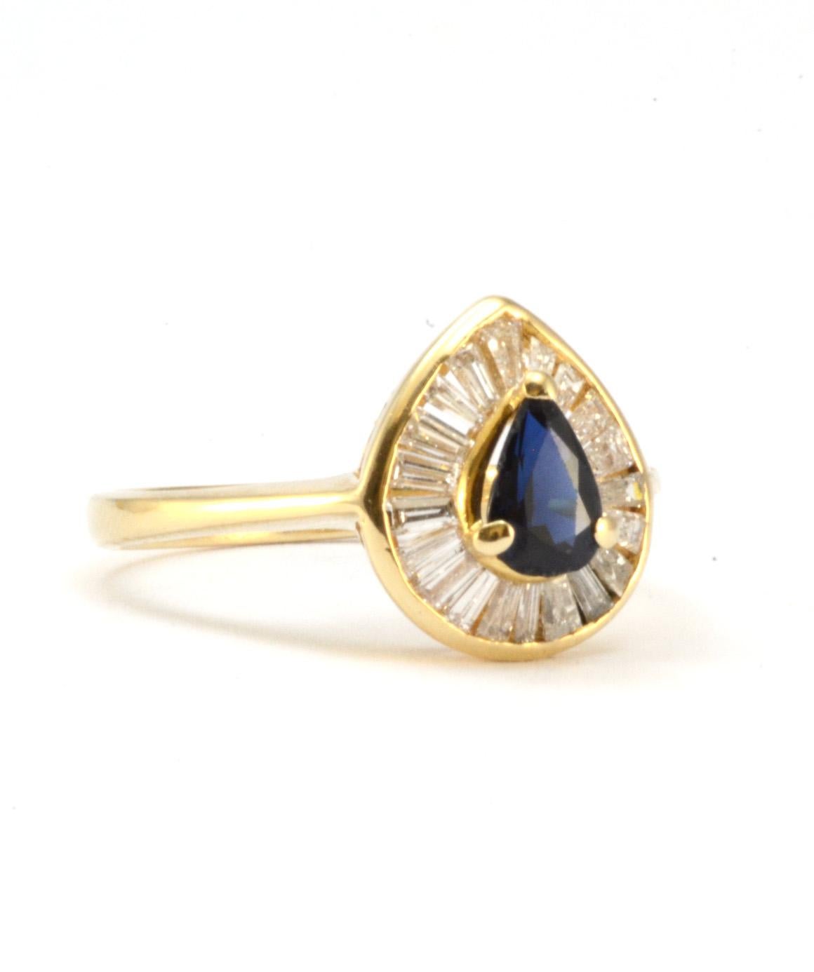 Solid 14K Yellow Gold Genuine Sapphire & Natural Diamond Ring! This ring is in excellent condition. It weighs about 2.6 grams, and is a size 5. There are about 20 baguette diamonds, approximately .04CTTW, and a center sapphire approximately .40ct.