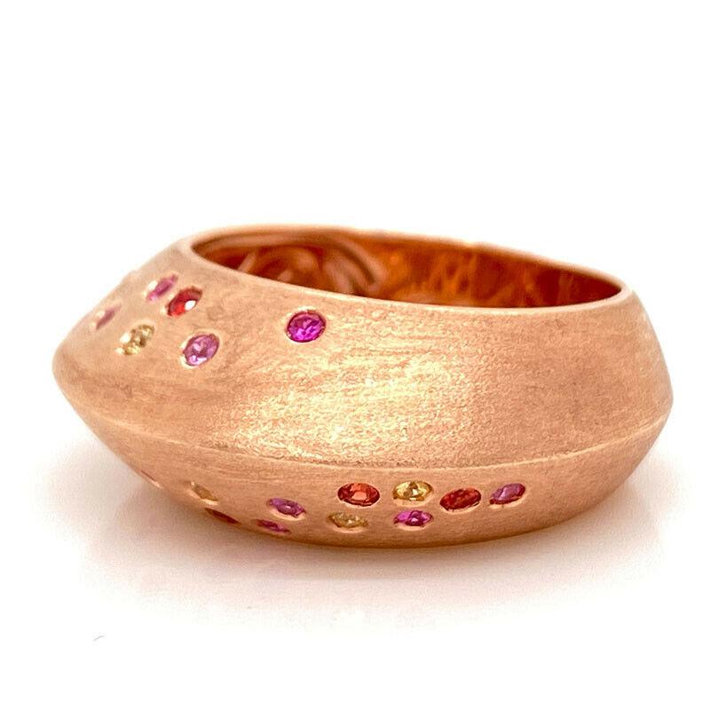 Solid 14K Rose Gold Genuine Pink, Yellow & Orange Sapphire Ring 7.8gExcellent condition. This solid 14K rose gold ring features 6 genuine pink sapphires, 3 orange sapphires & 3 yellow sapphires. The ring is a size 7.5 and weighs 7.8 grams.