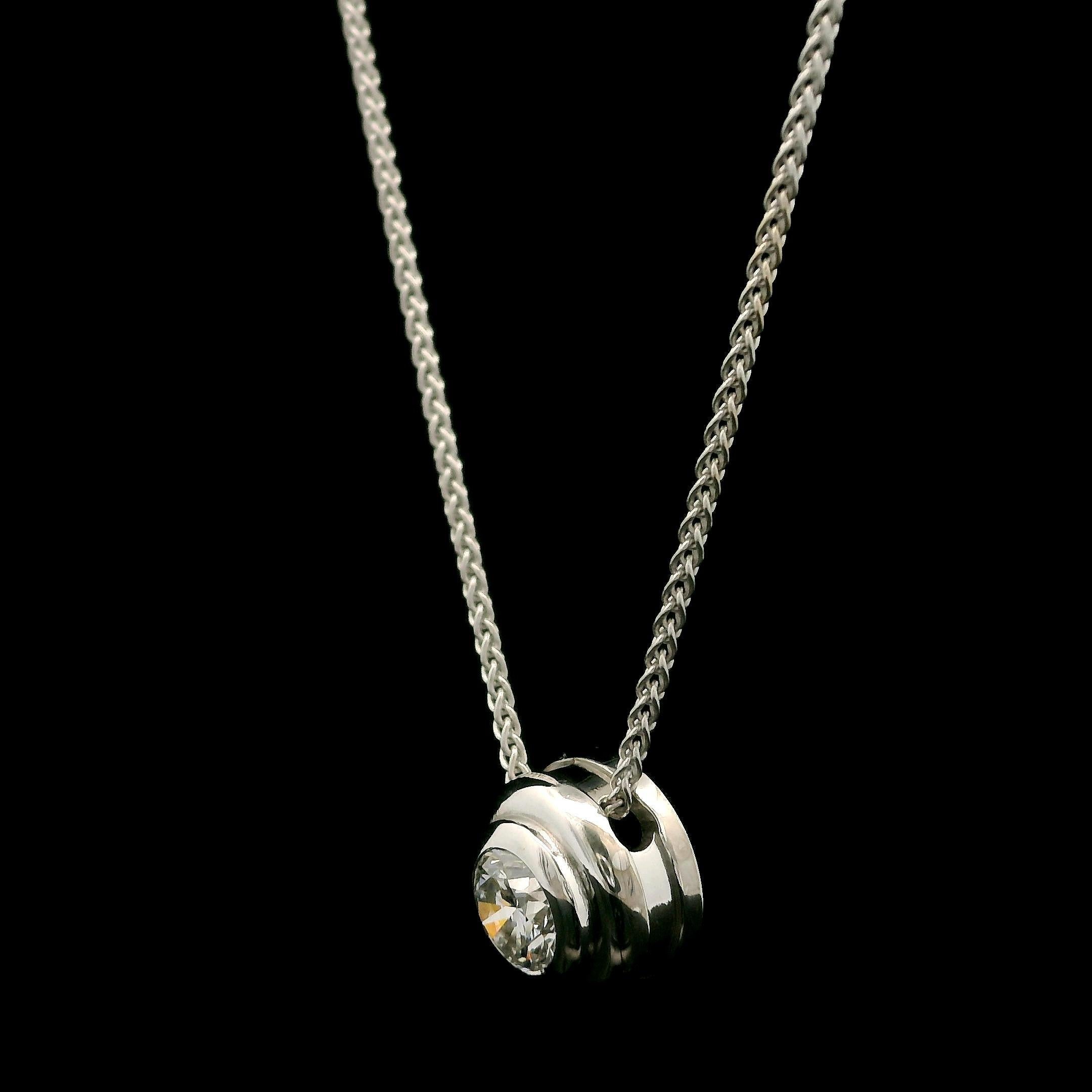 --Stone(s):--
(1) Natural Genuine Diamond - Round Brilliant Cut - Bezel Set - G Color - SI1 Clarity - 0.40ct (approx.)

Material: Solid 14k White Gold 
Weight: 3.78 Grams
Chain Type: 18