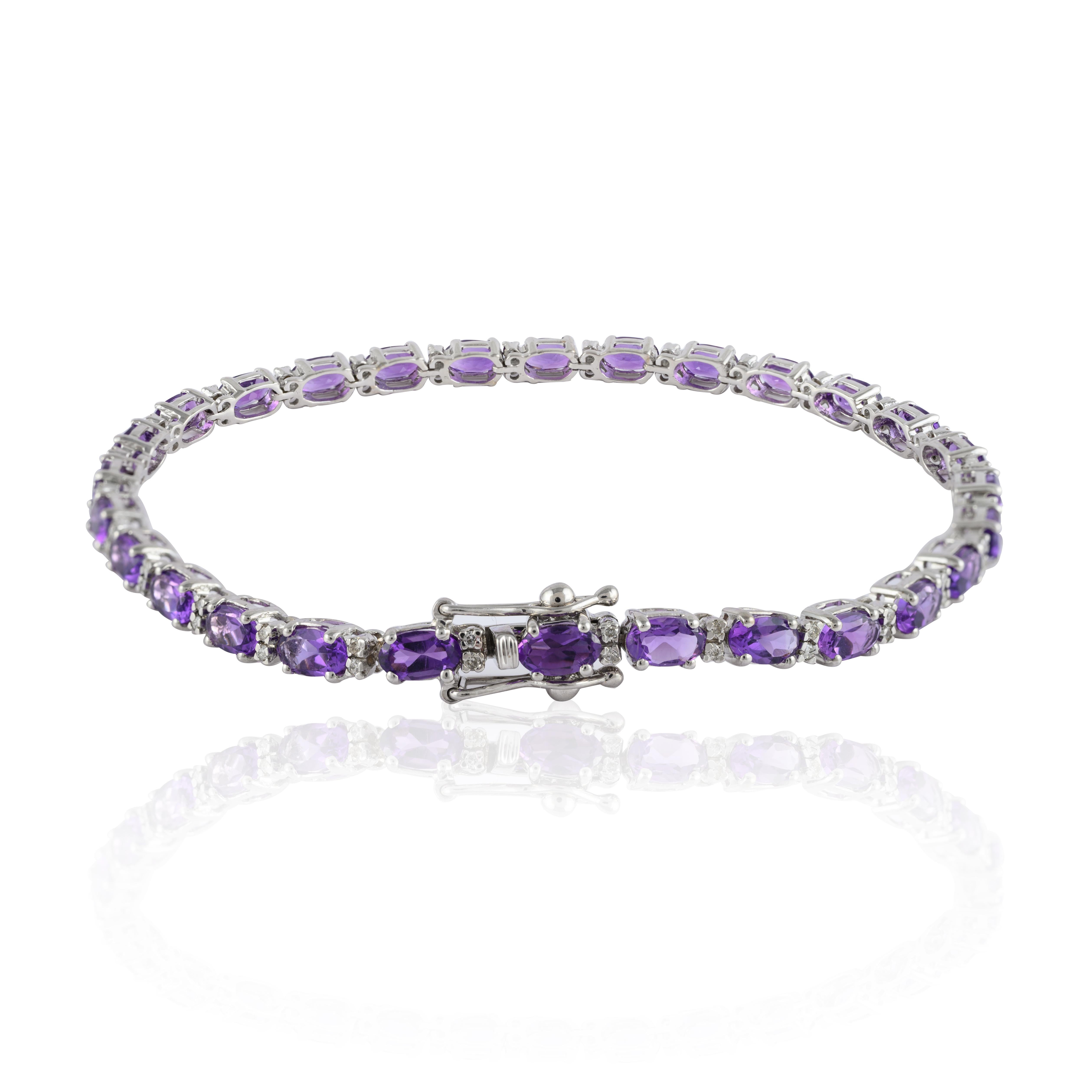 This Amethyst Tennis Bracelet with Diamonds in 14K gold showcases 28 endlessly sparkling natural amethyst, weighing 5.65 carat. It measures 7 inches long in length. 
Amethyst is a protective stone that helps to reduce stress and anxiety in your