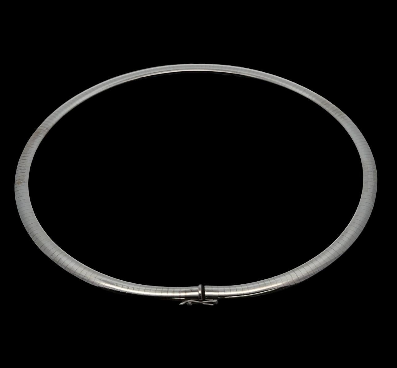 Material: 14k Solid White Gold
Weight: 33.43 Grams
Chain Type: Polished Omega Link
Chain Length: 18 Inches 
Chain Width: 6mm (0.23
