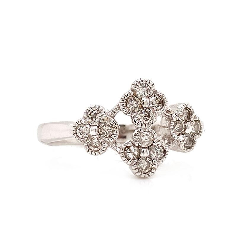 Solid 14K White & Rose Gold Natural Diamond Flower Ring 3.5g
Excellent condition. This solid 14K white & rose gold ring features 3 flowers that can spin 360 degrees. There is approximately 0.60CTTW of diamonds between the 28 natural diamonds