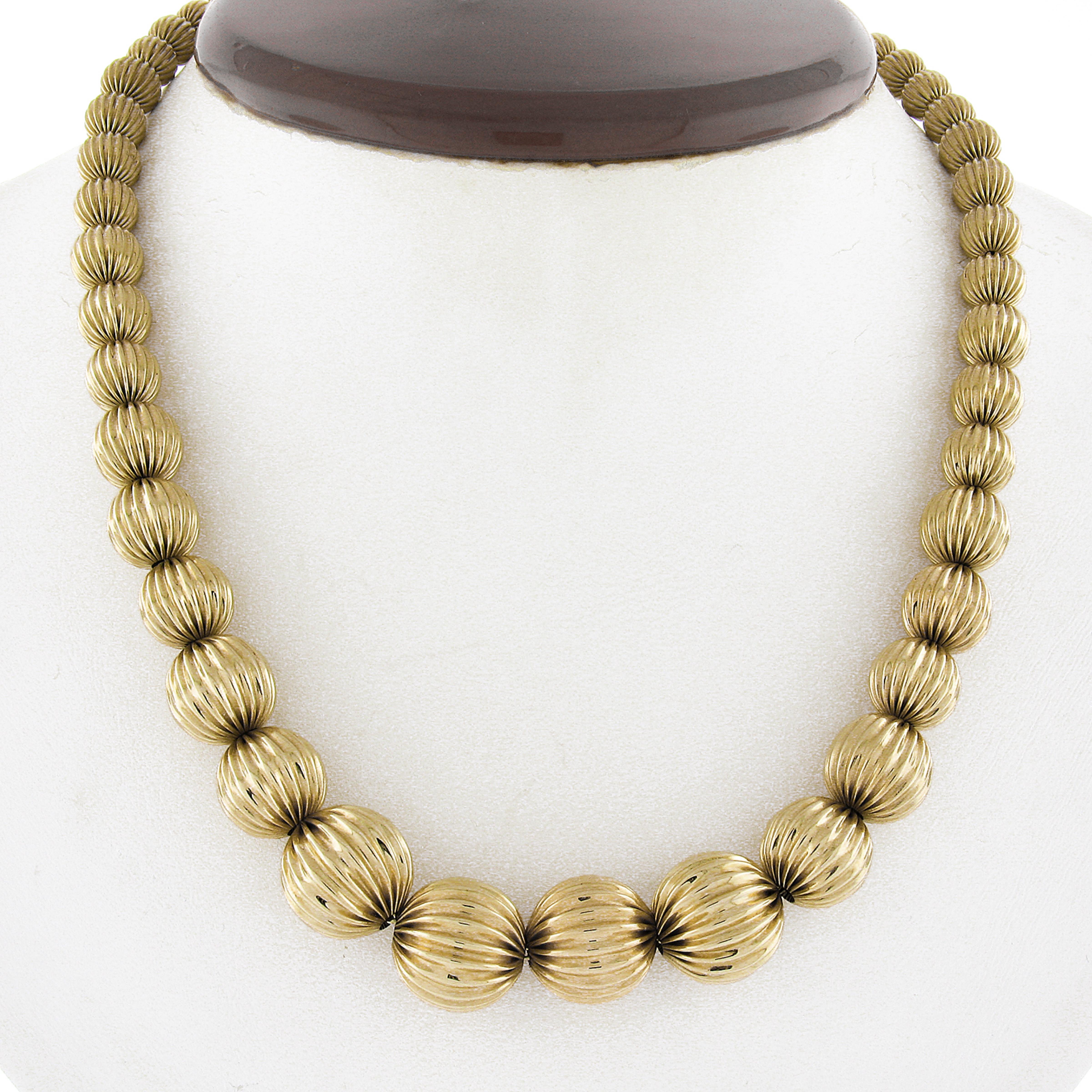 Material: Solid 14k Yellow Gold 
Weight: 21.87 Grams
Chain Type: Graduated Grooved Bead Gold on Cable Link Chain
Length: 16 Inches (measured next to a ruler)
Width: Graduated from 5.9mm to 13.1mm 
Clasp: Hook w/ Push Clasp
Condition: Excellent