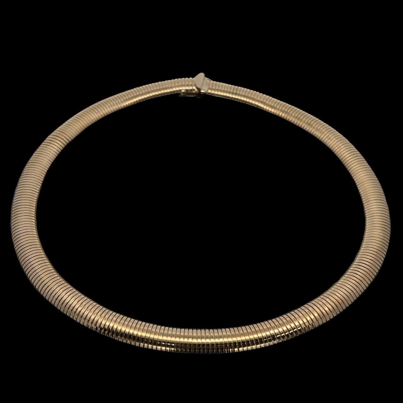 Material: 14k Solid Yellow Gold
Weight: 45.5 Grams
Chain Type: Tubogas Accordion Link
Chain Length: 16.5 Inches
Width: 9.4mm (0.37